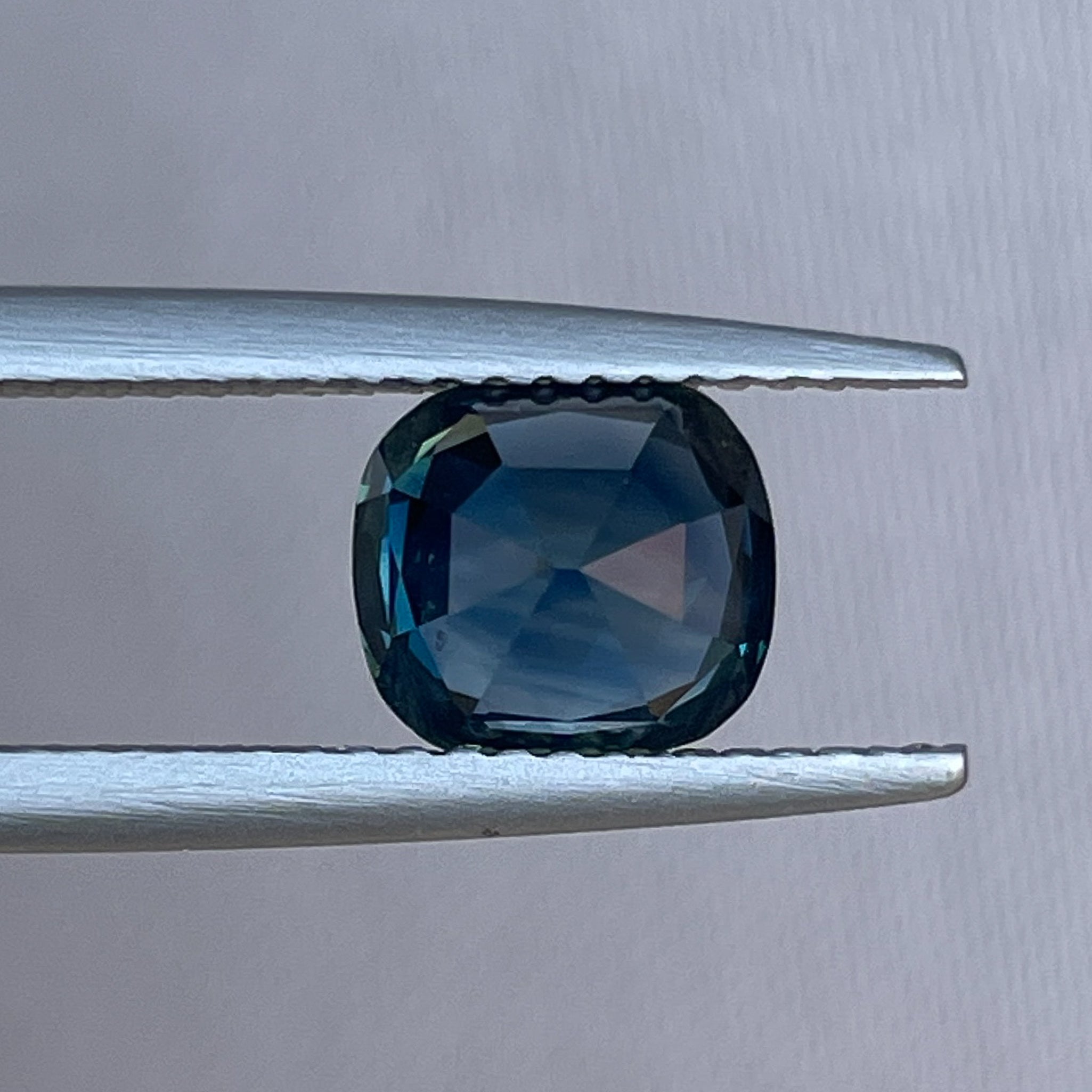 Natural teal sapphire 2.02 Ct cushion cut loose gemstone from NASHGEMS, ideal for engagement rings or custom jewelry.