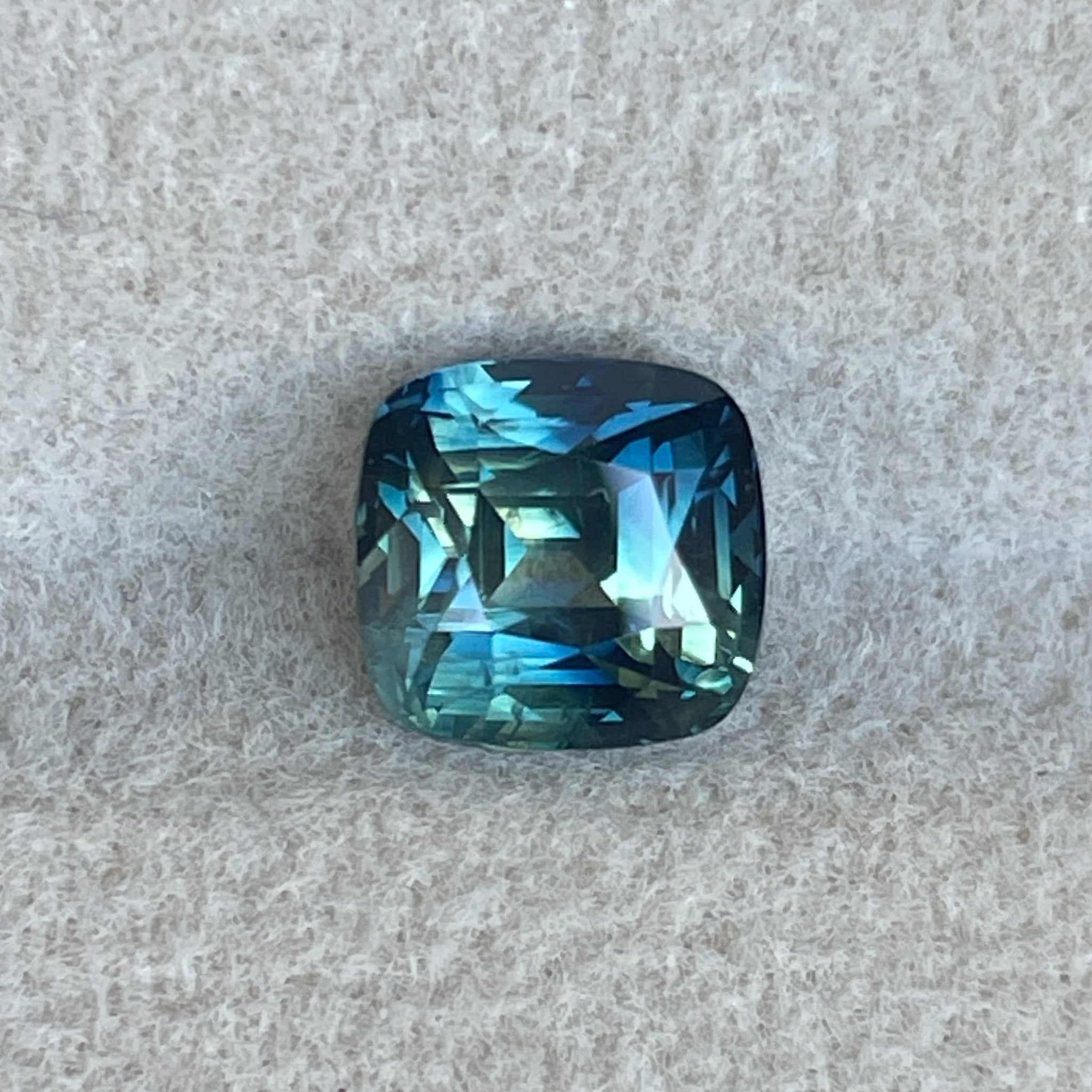 Natural blue-green cushion cut sapphire by NASHGEMS, 2.14 Ct teal loose sapphire for jewelry or engagement rings.