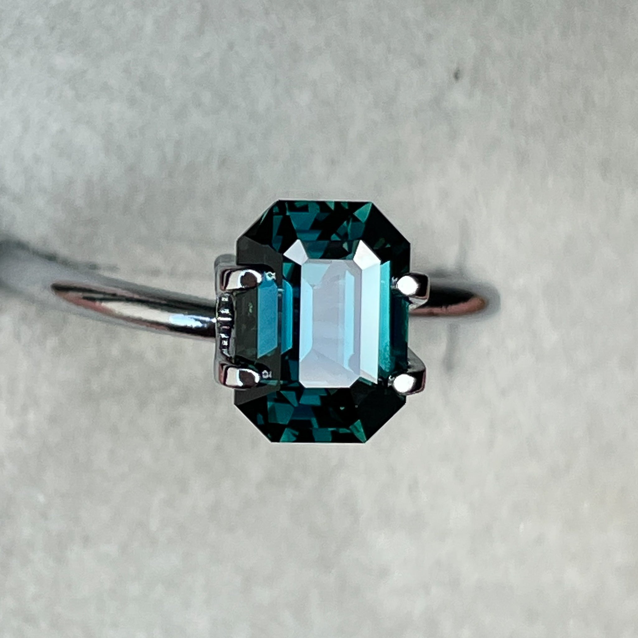 Natural teal blue green sapphire, 2.18 Ct emerald cut, heat-treated loose gemstone by NASHGEMS for jewelry or engagement use.