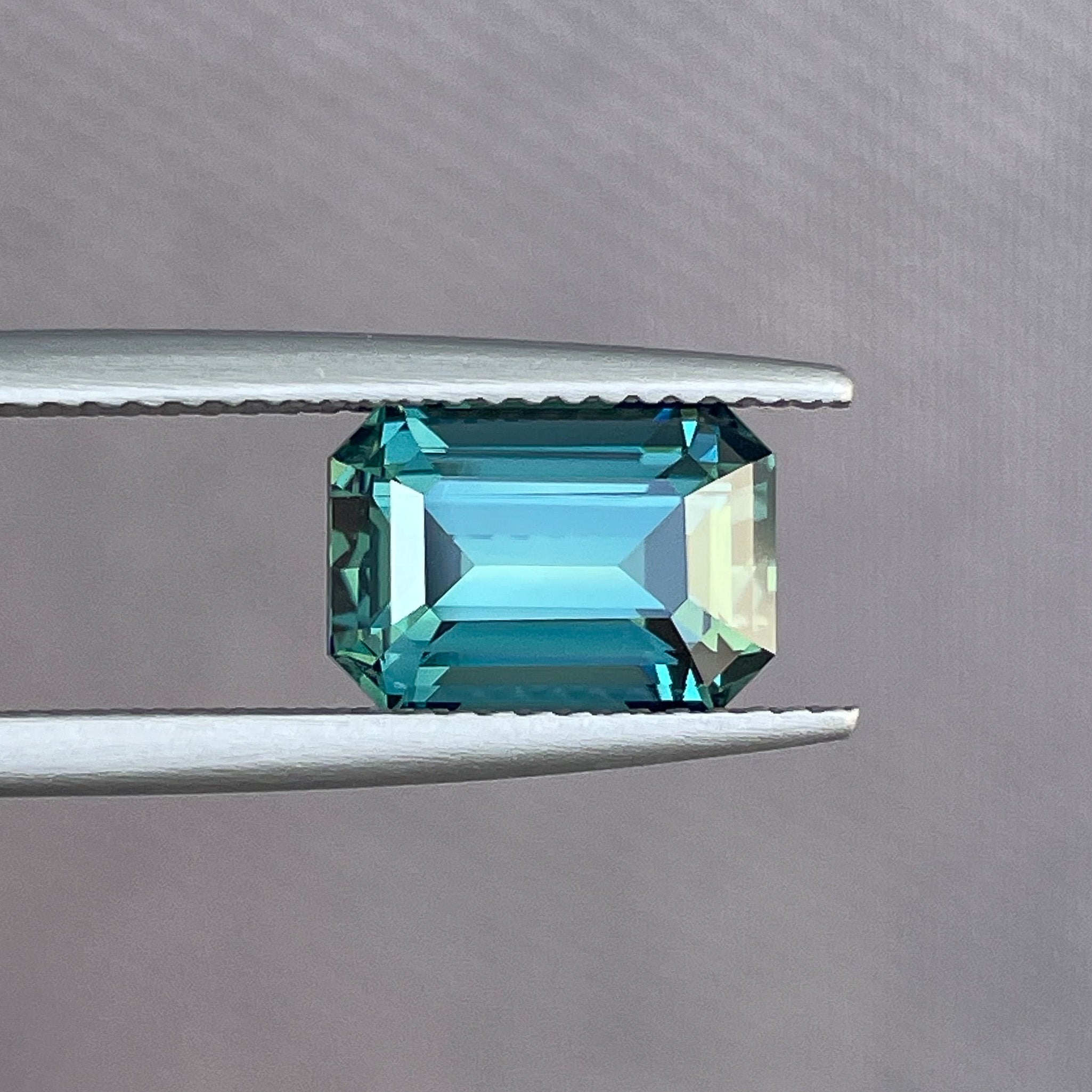 Natural teal blue-green sapphire, 3.71 Ct emerald cut loose gemstone by NASHGEMS, ideal for engagement or custom jewelry.