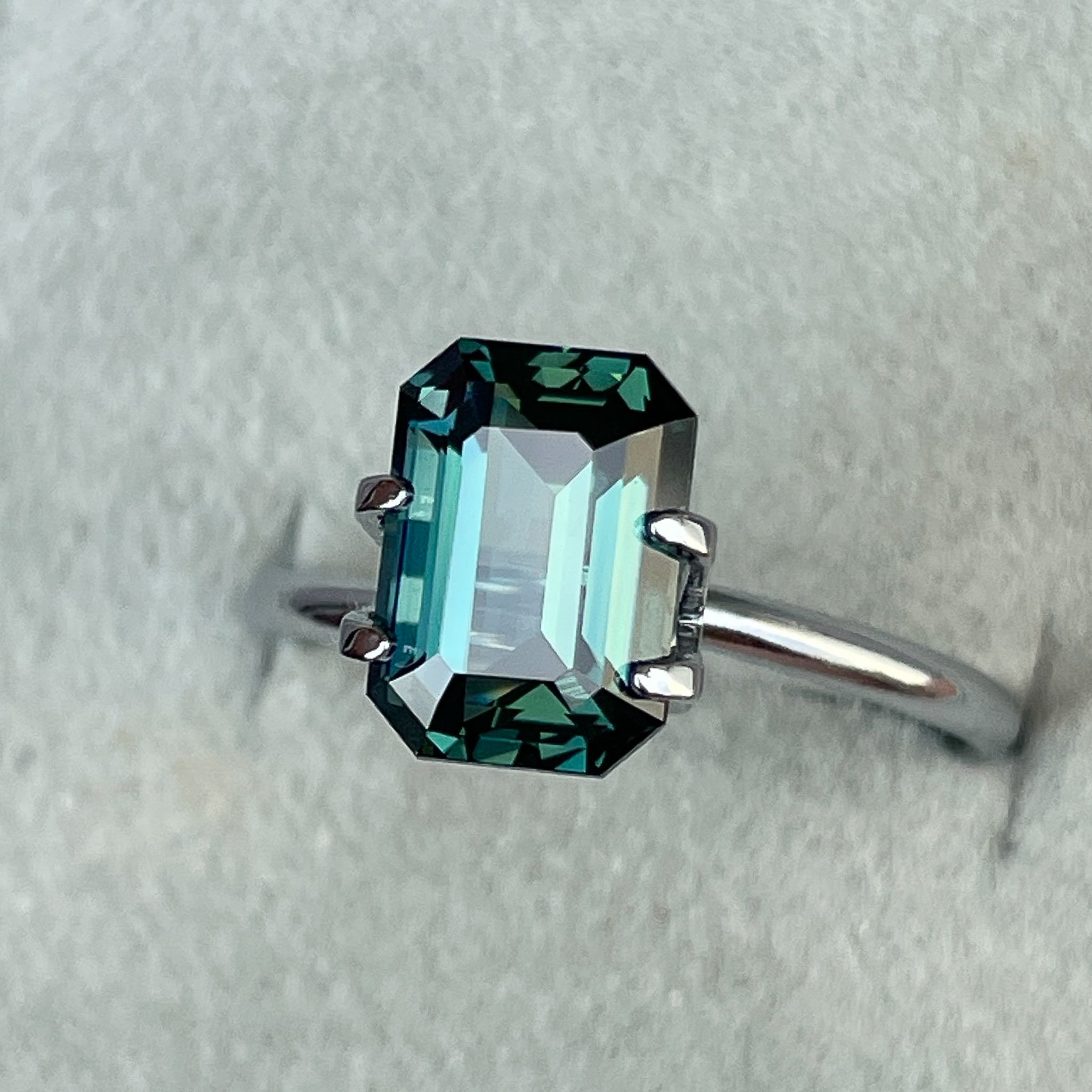 Natural teal blue green sapphire, 3.71 Ct emerald cut loose gemstone by NASHGEMS, ideal for engagement rings or custom jewelry.