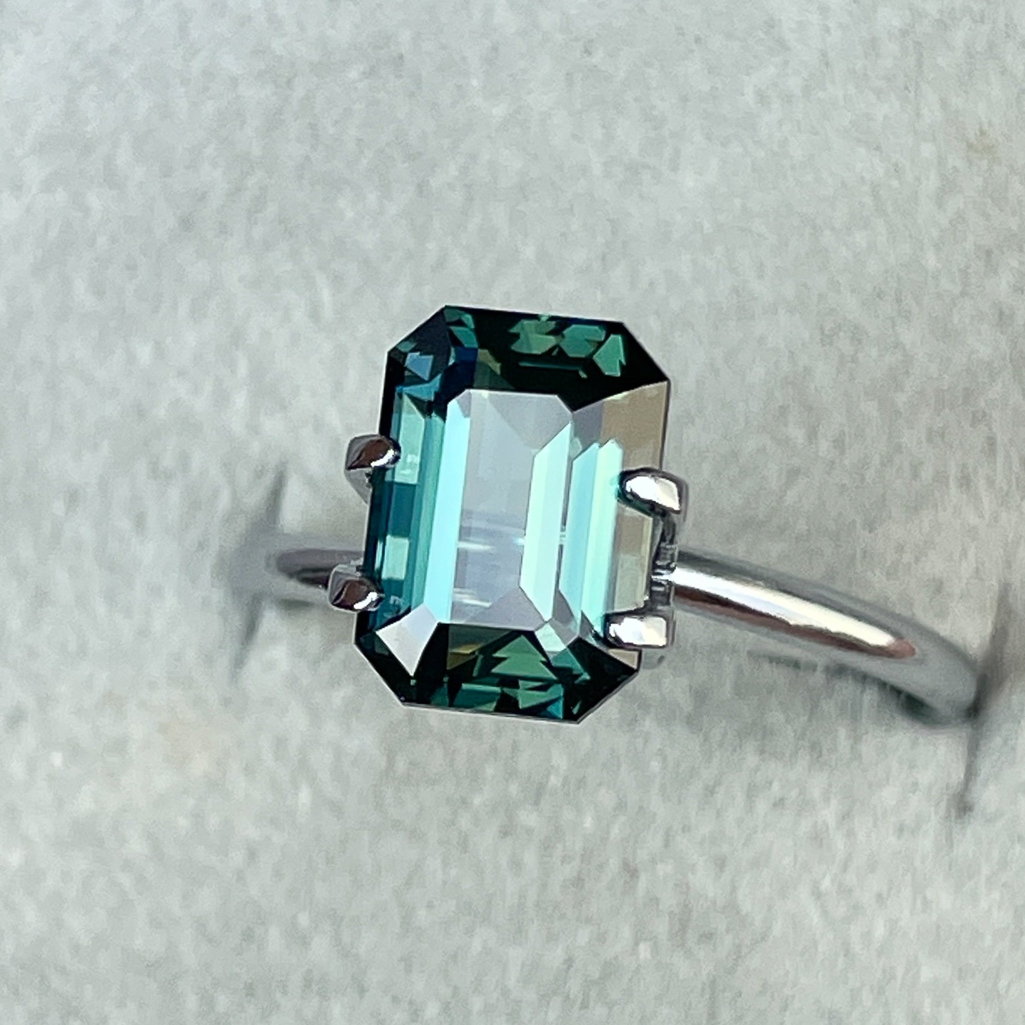 Natural teal blue-green sapphire, 3.71 ct emerald cut, loose no heat gemstone by NASHGEMS for jewelry or engagement rings.