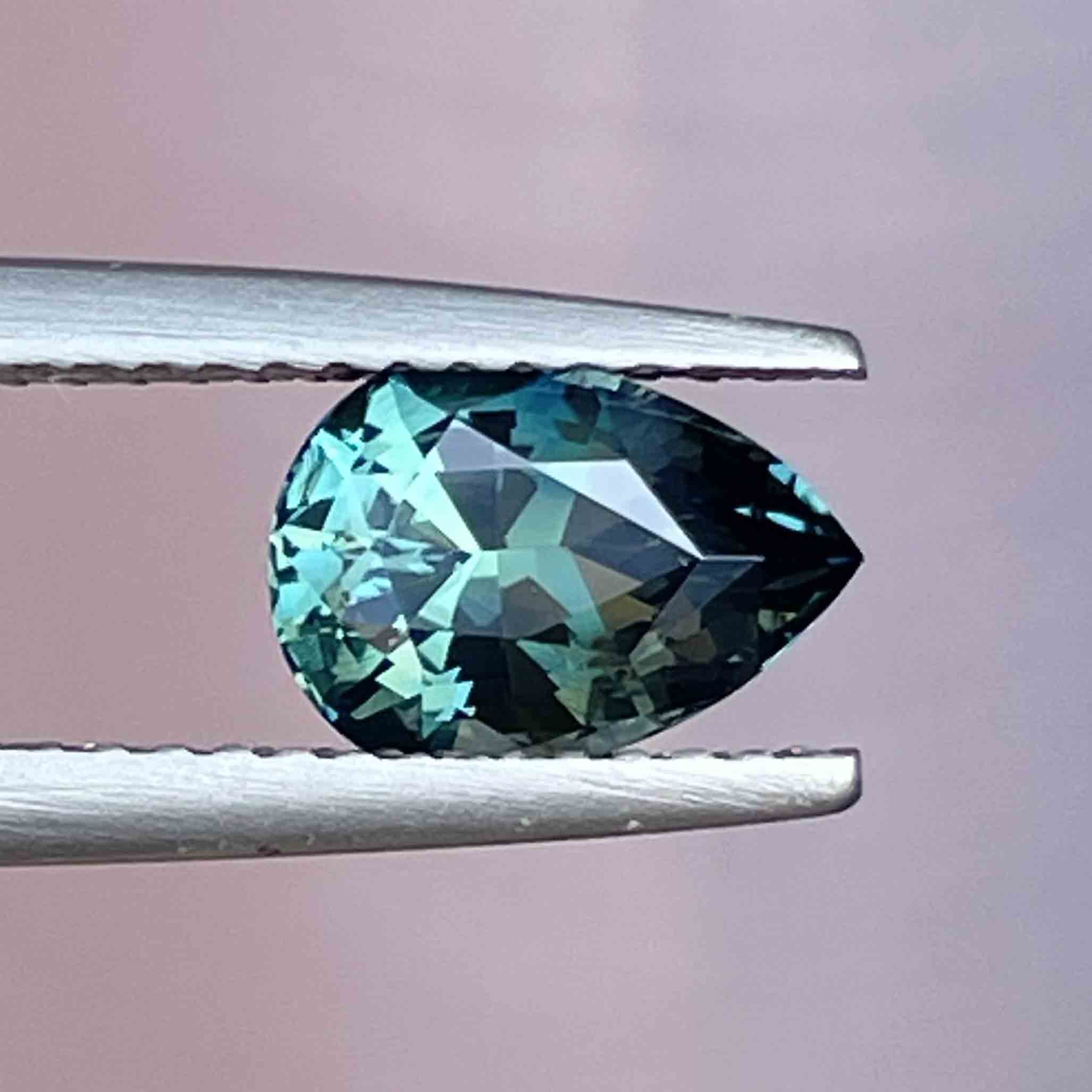 Natural teal blue green sapphire, 1.57 Ct pear-shaped loose gemstone for custom engagement rings by NASHGEMS.