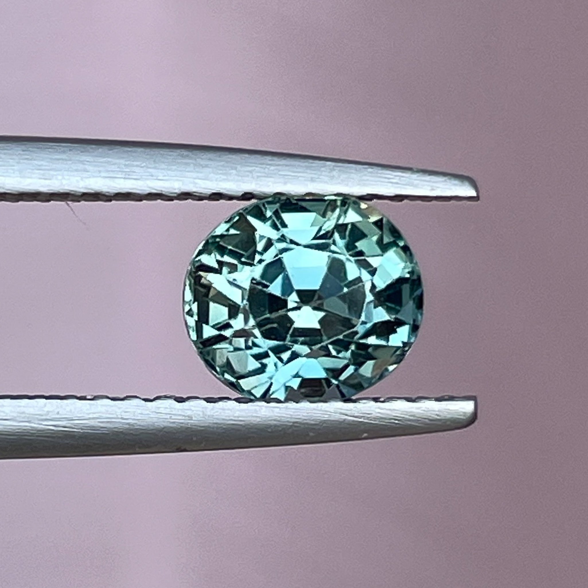Natural teal sapphire 1.65 Ct oval cut loose gemstone by NASHGEMS, perfect for engagement rings or custom jewelry.