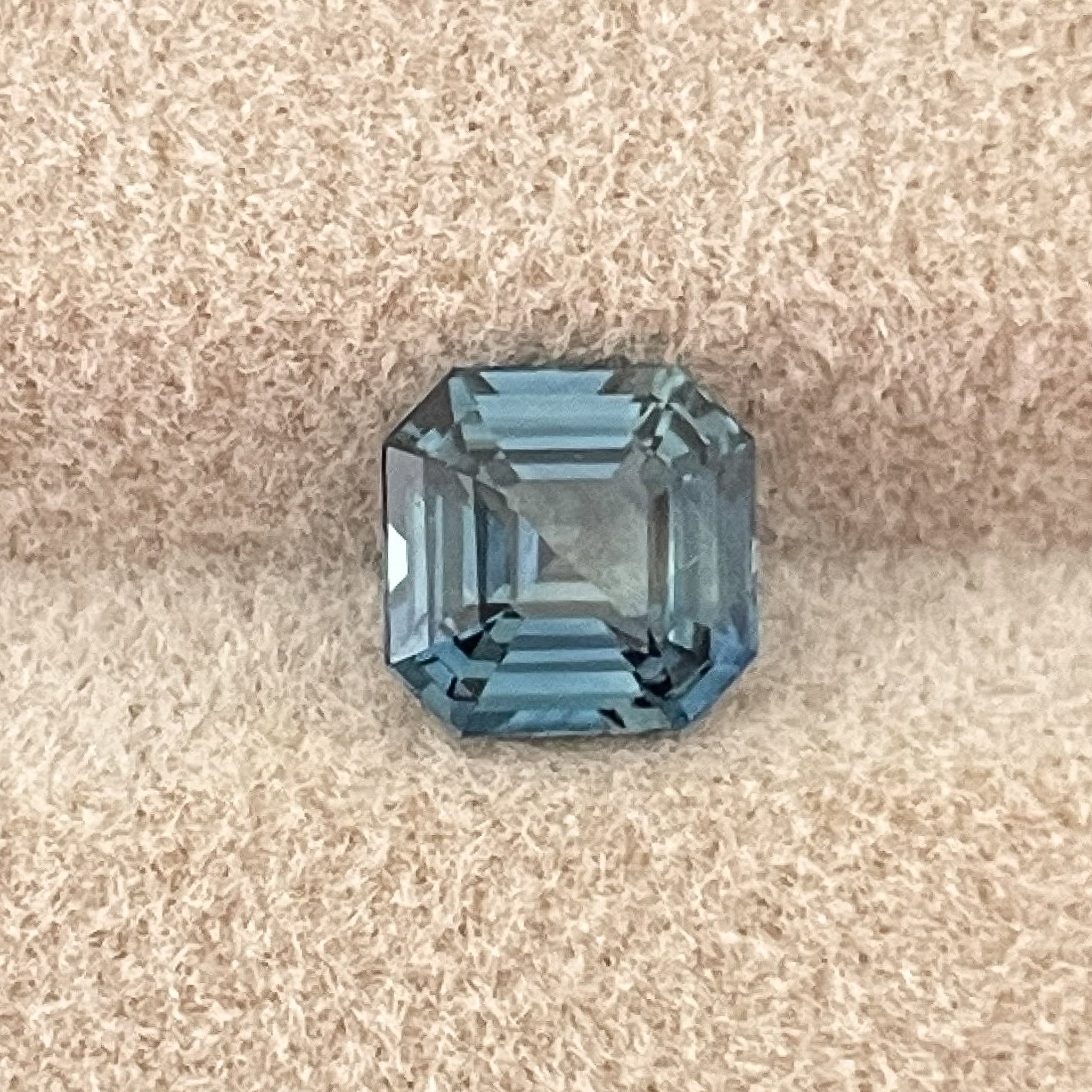 Teal blue sapphire loose gemstone, 1.52 Ct emerald cut by NASHGEMS, ideal for engagement rings or custom jewelry.