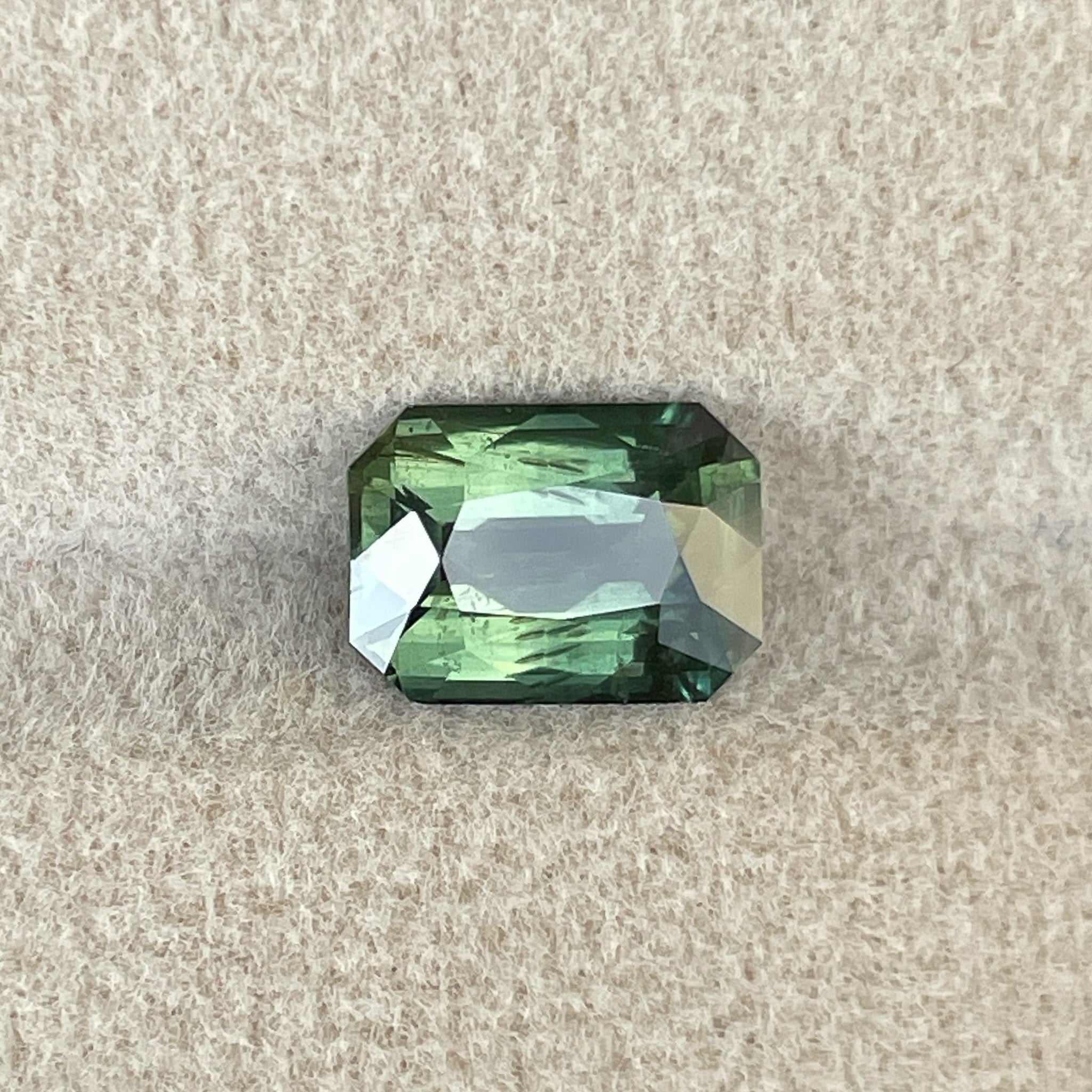 Teal green sapphire 2.36 Ct radiant cut, heat treated loose gemstone from NASHGEMS for engagement or custom jewelry.
