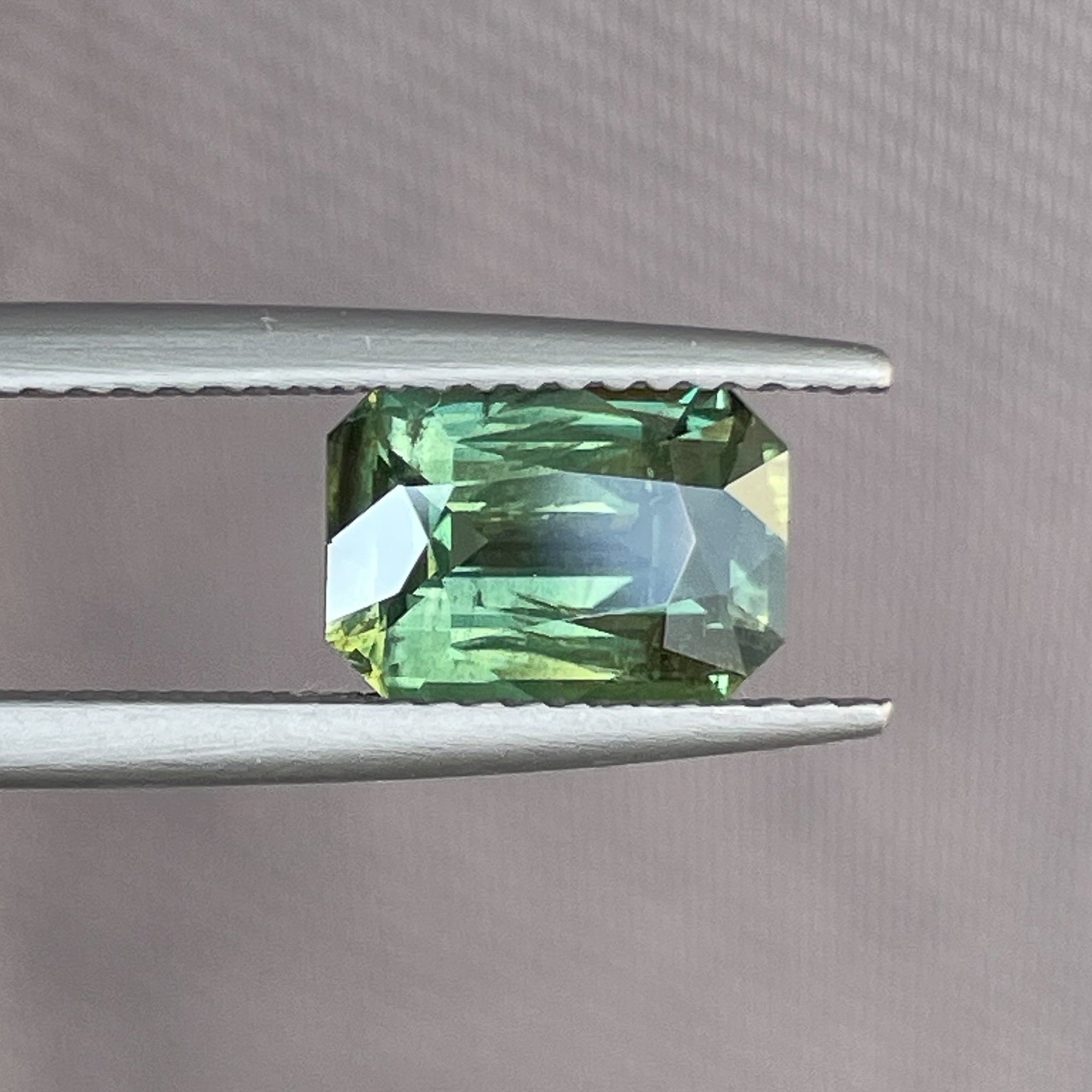 Natural green sapphire, 2.36 Ct radiant cut teal loose gemstone by NASHGEMS, ideal for engagement rings or custom jewelry.