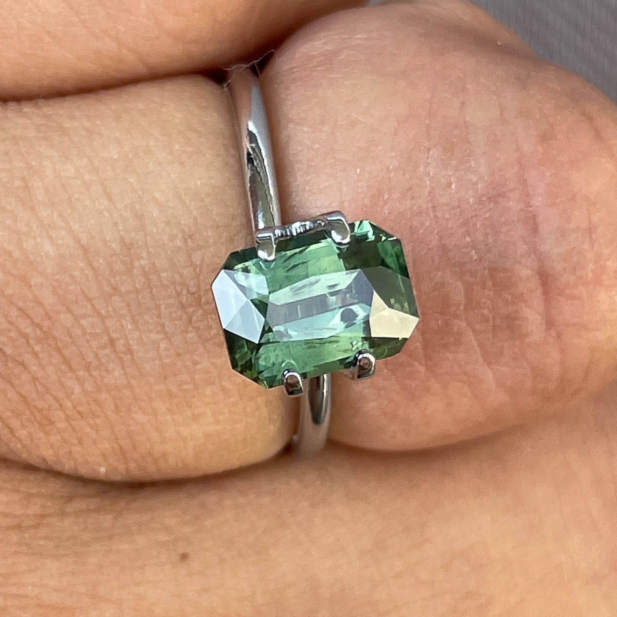 Natural green sapphire 2.36 Ct radiant cut by NASHGEMS, teal gemstone suitable for engagement rings or custom jewelry.