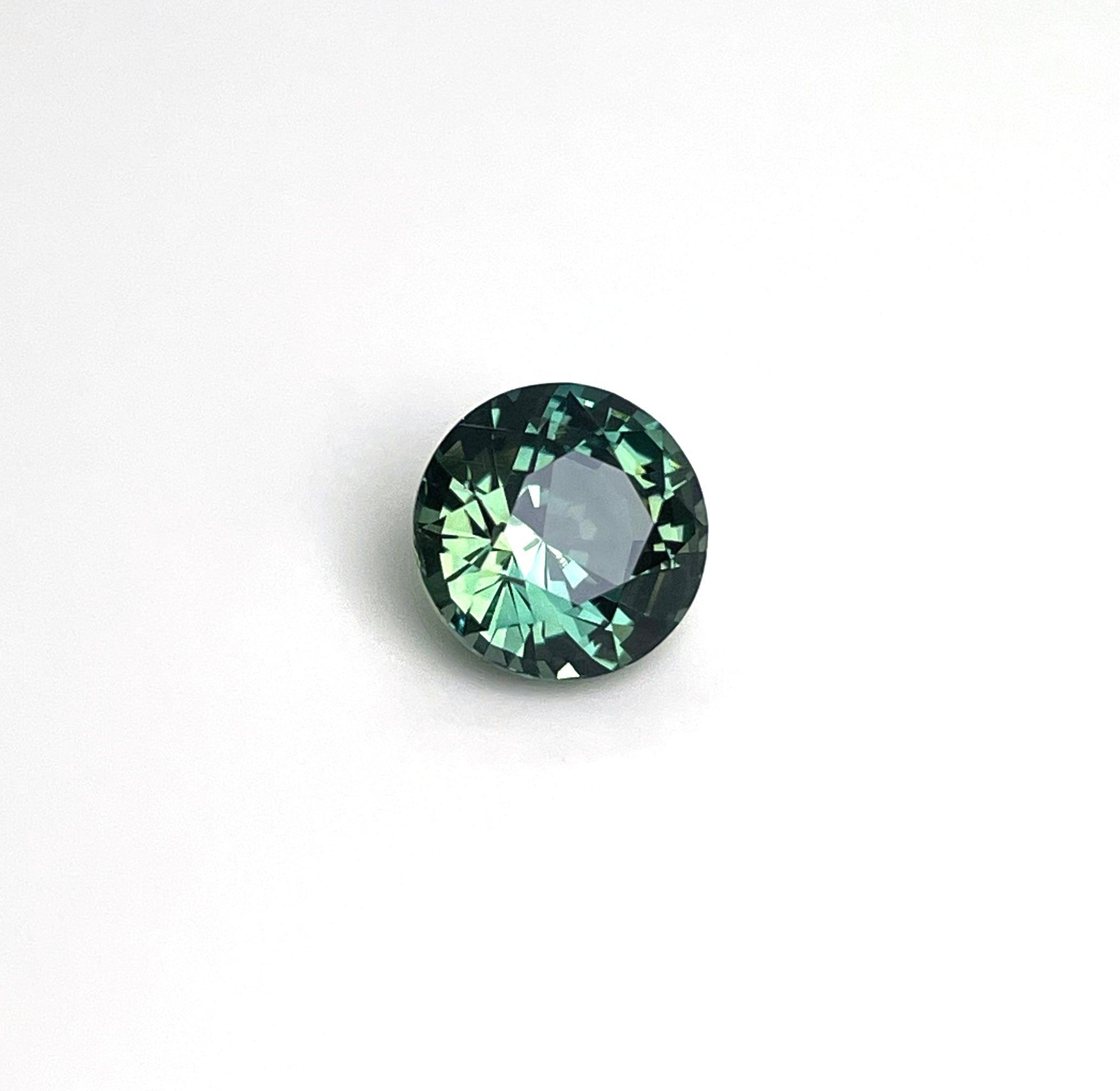 2.22 carat Teal/ Parti Sapphire is well cut to bring out the best colour and luster,