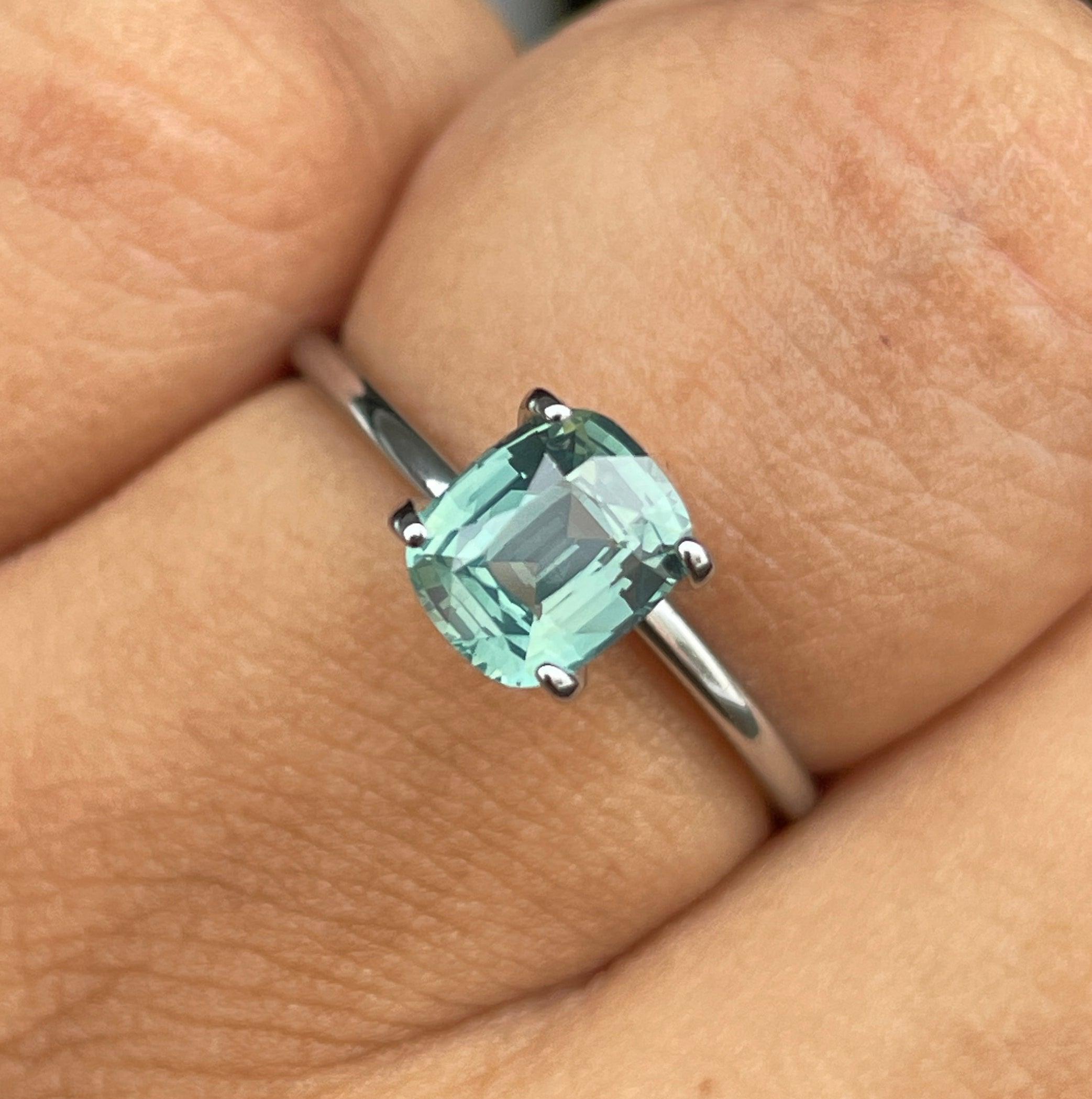 teal blue green parti sapphire cushion cut gem