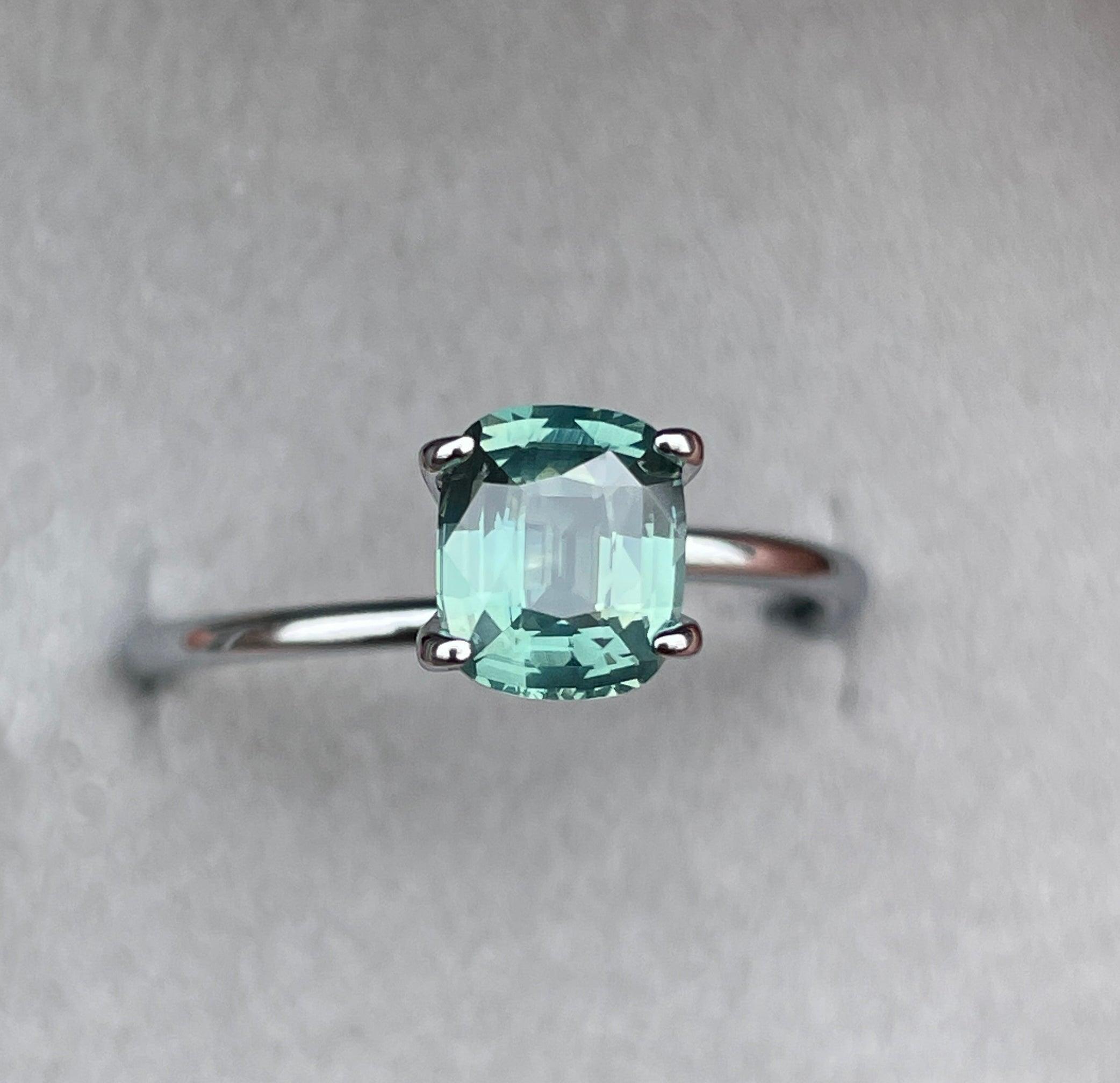 teal blue green parti sapphire cushion cut gem