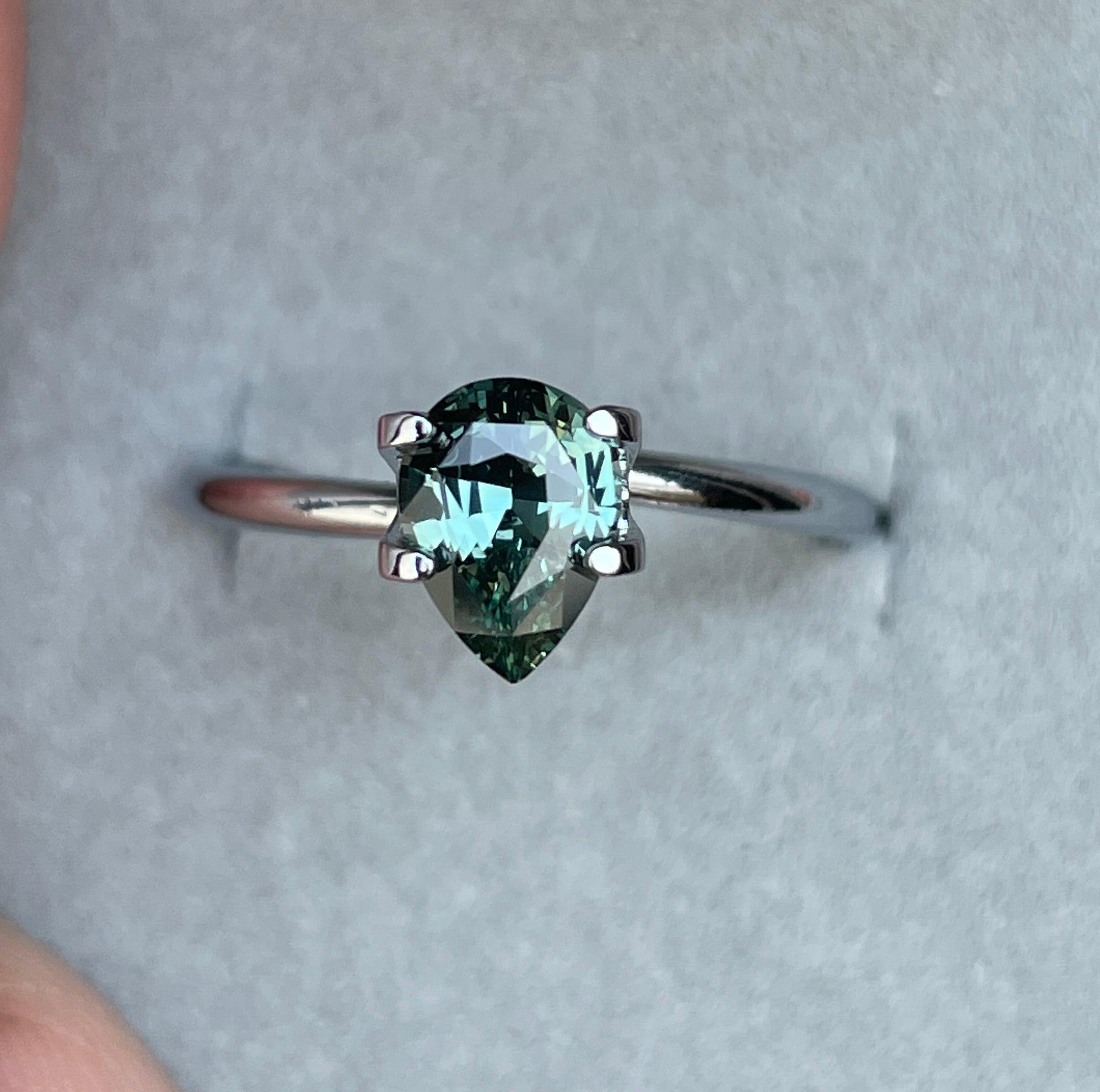 teal blue green parti sapphire pear drop cut gem