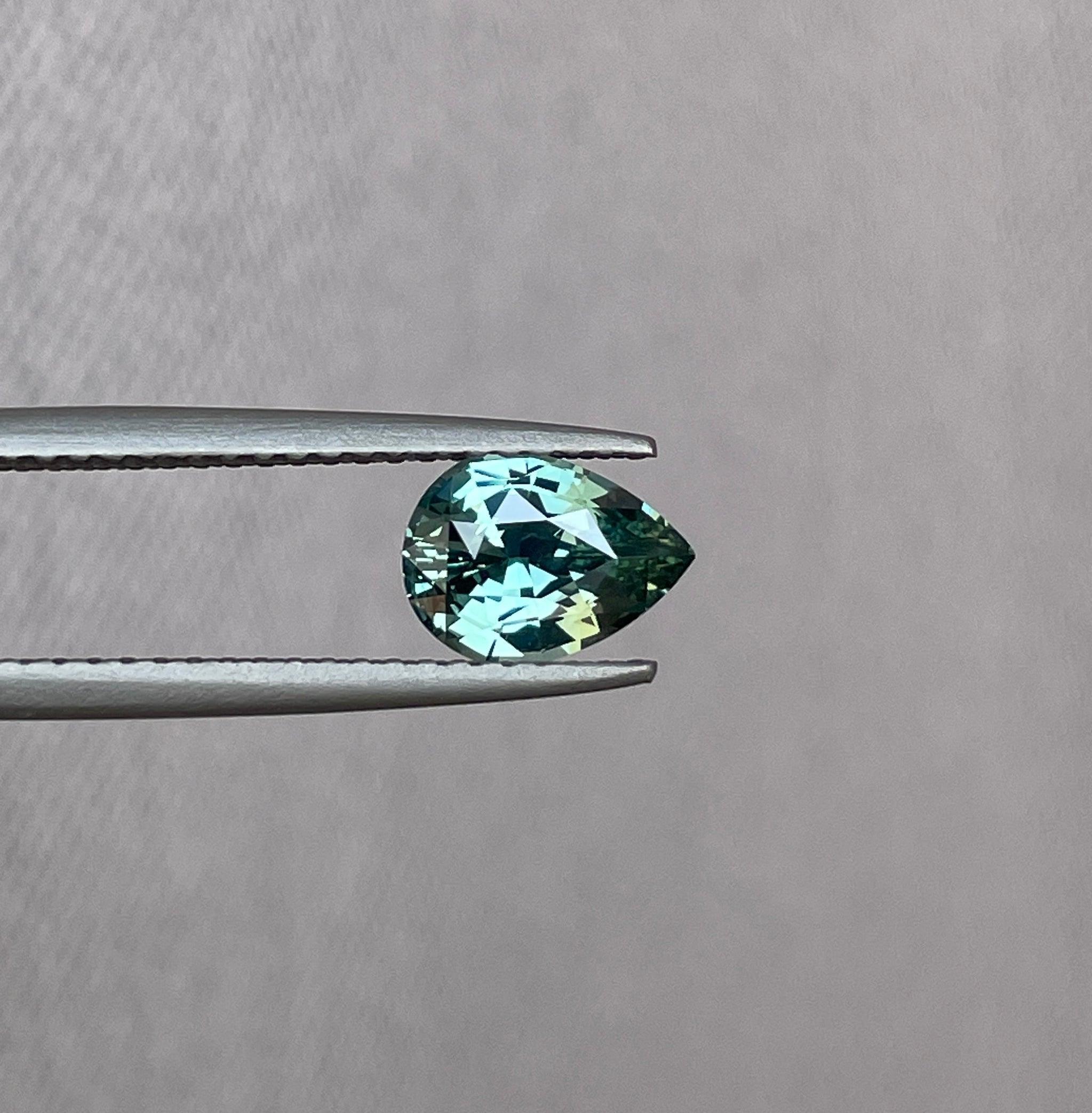 teal blue green parti sapphire pear drop cut gem