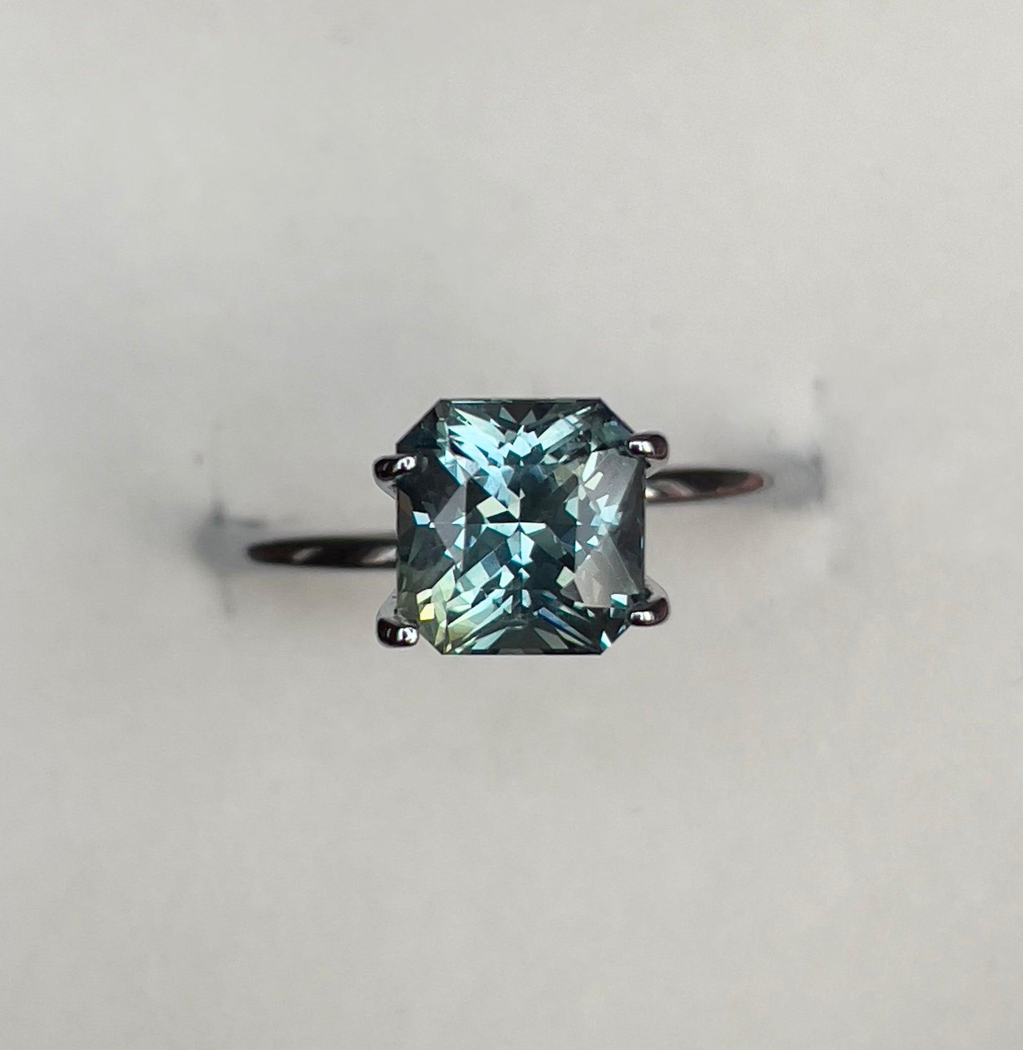 teal sapphire engagement rings
