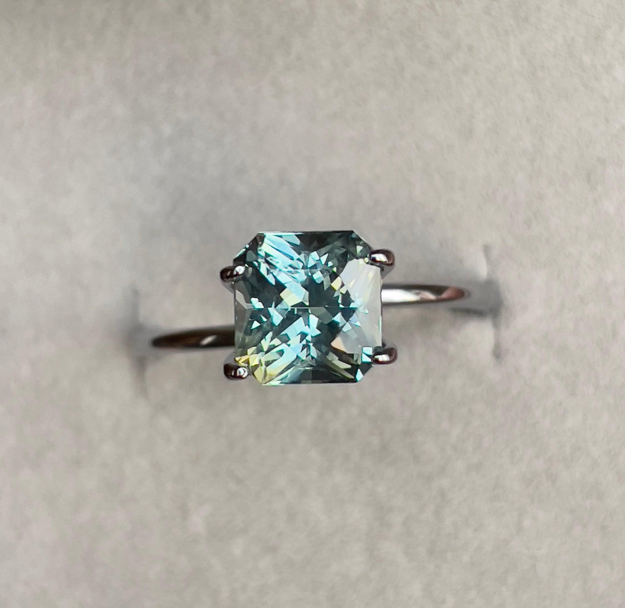 teal sapphire engagement rings