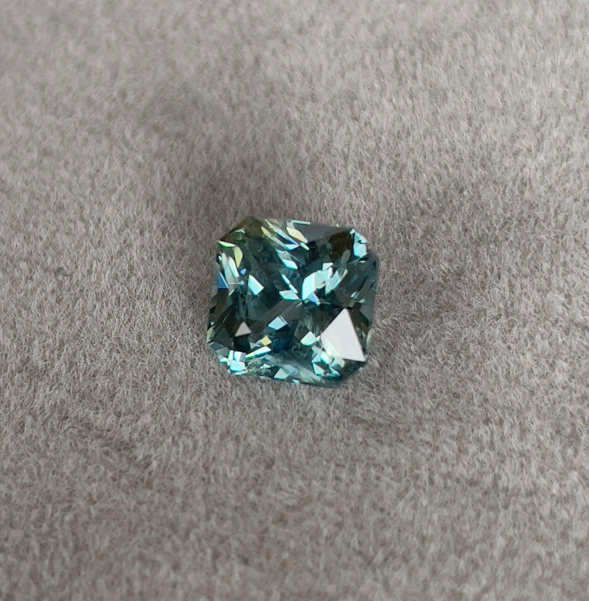 teal sapphire engagement rings