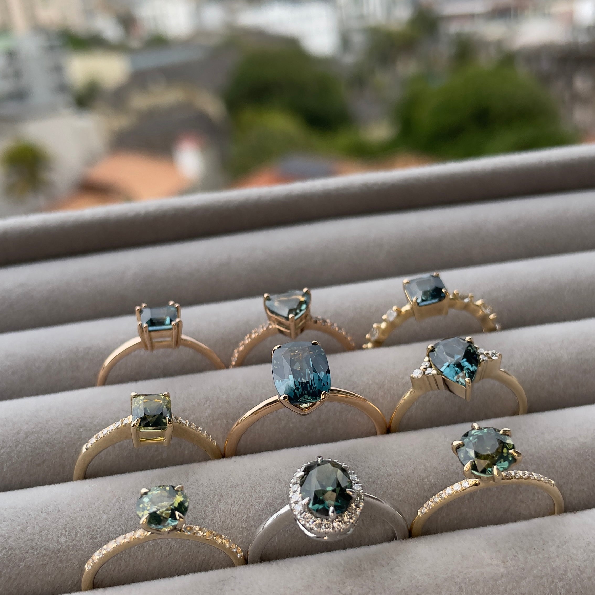 variety of sapphire rings on a tray