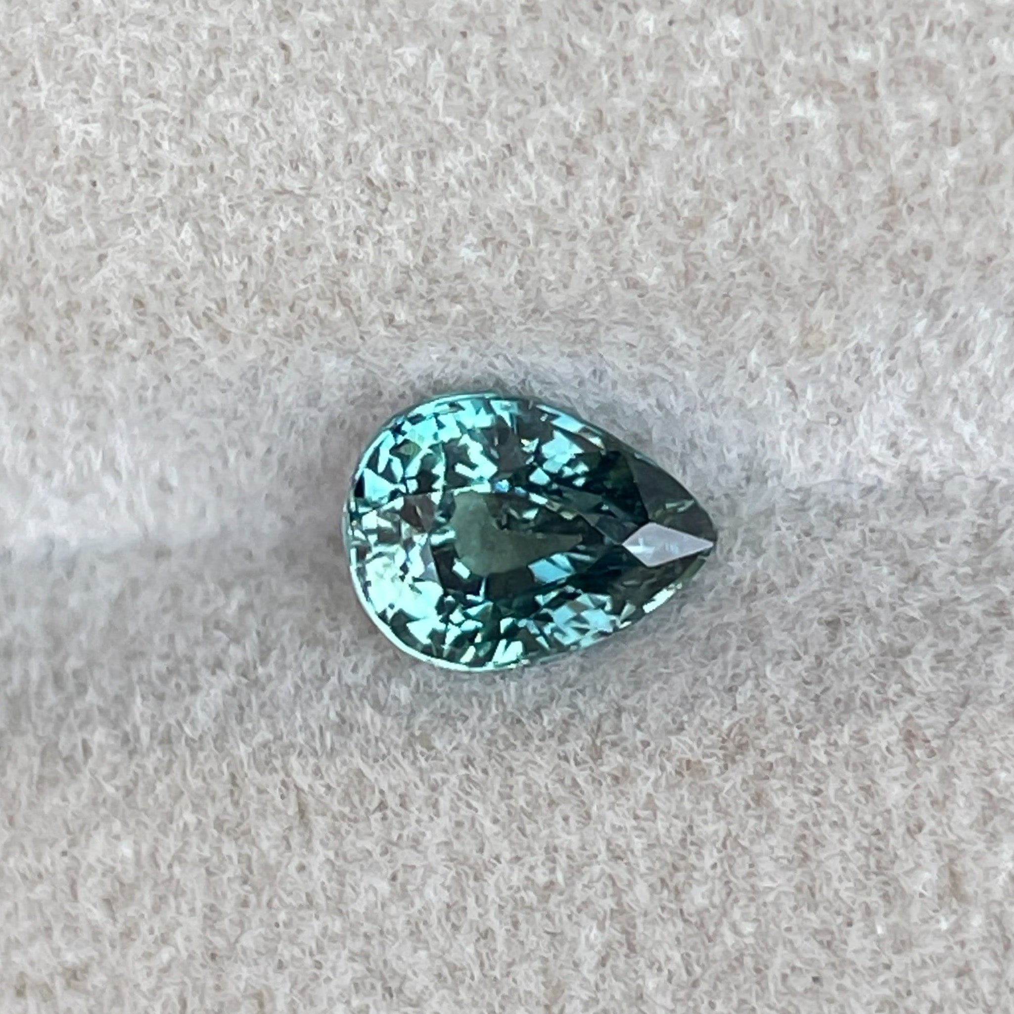 Natural teal sapphire loose gemstone, 1.09 ct pear shape, heated teal sapphire for jewelry, from NASHGEMS.