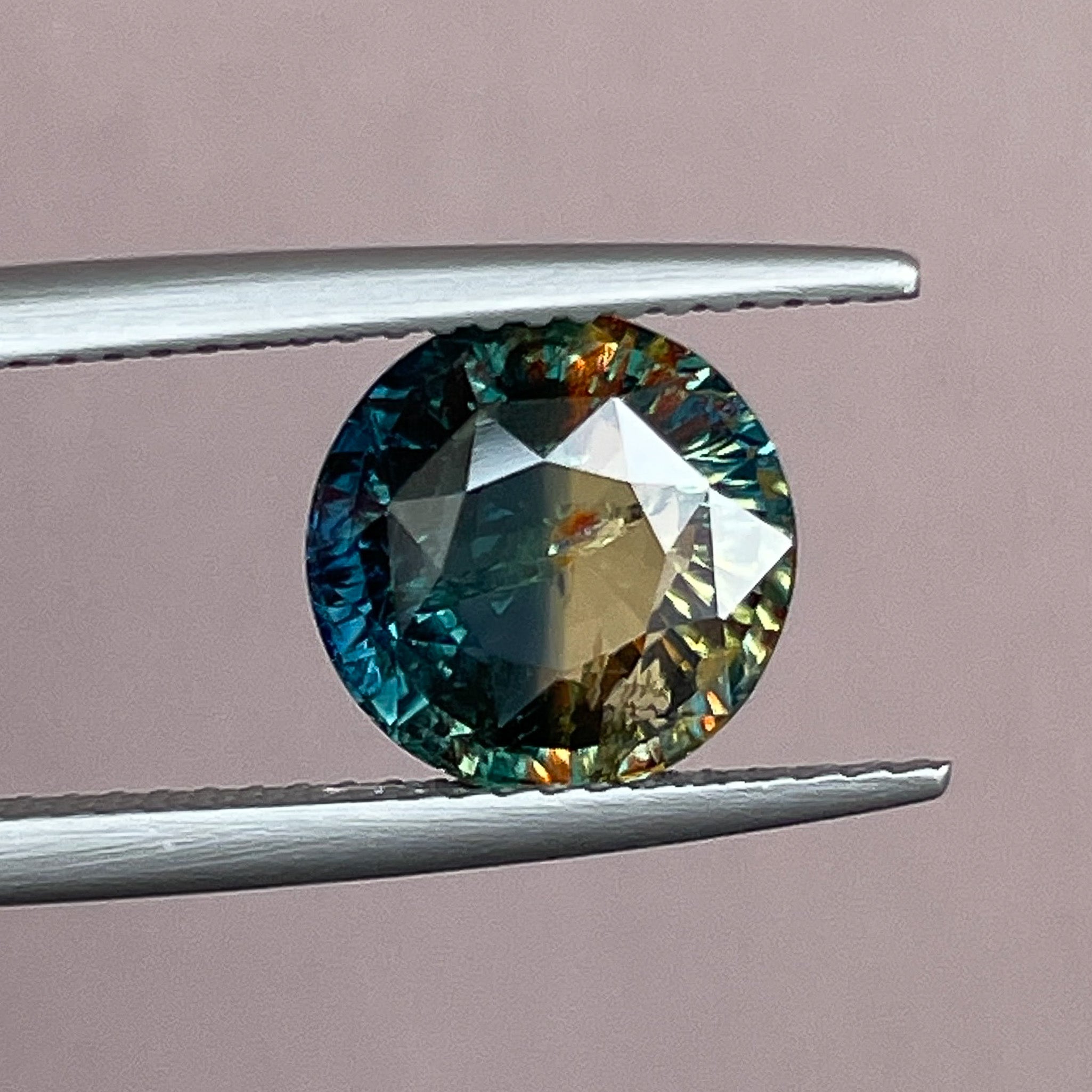 Teal round cut natural bi-color sapphire, 3.70 Ct, loose gemstone from NASHGEMS, ideal for engagement rings or custom jewelry.
