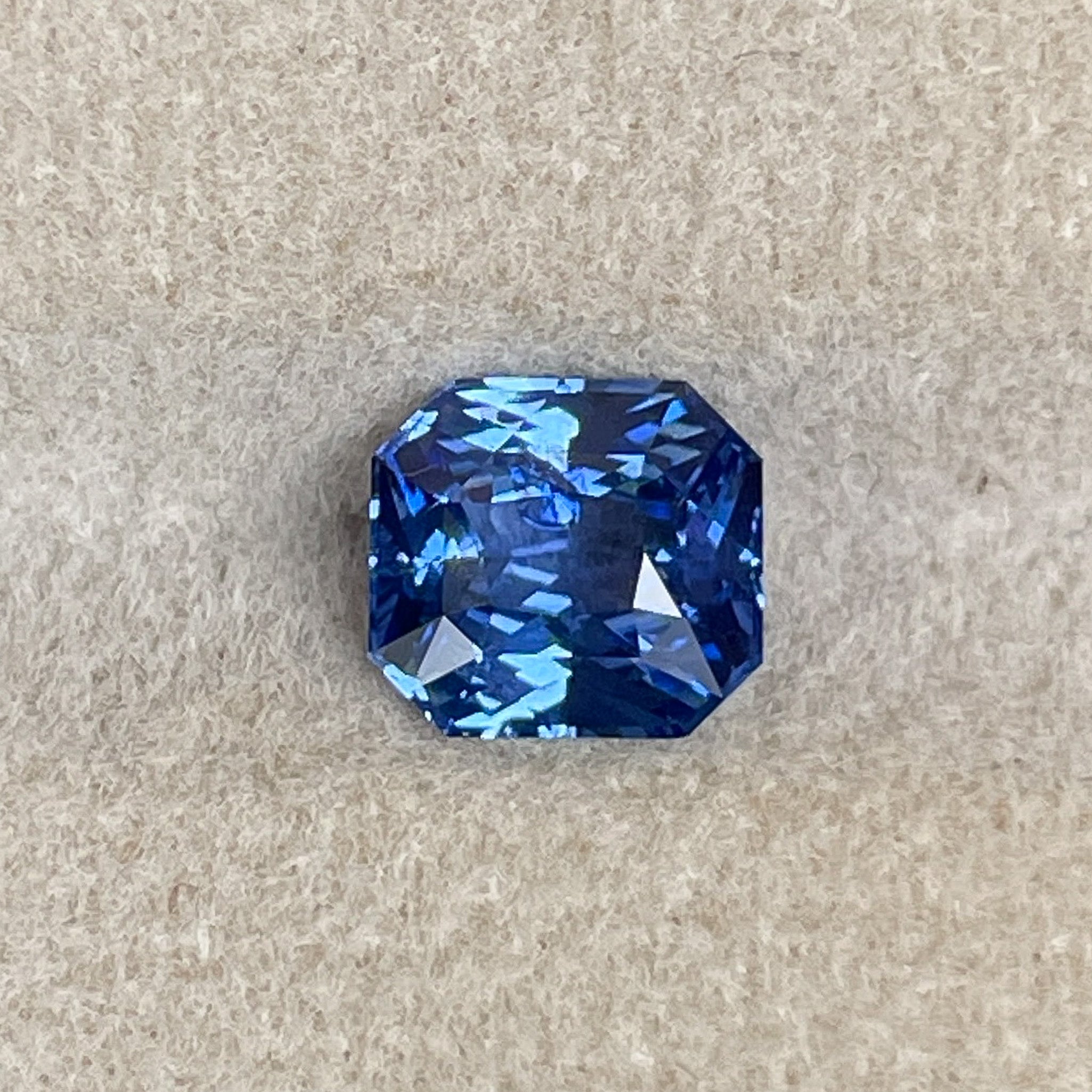 Natural Ceylon Blue Sapphire 1.52 Ct radiant cut, vivid blue loose gemstone by NASHGEMS for engagement or custom jewelry.