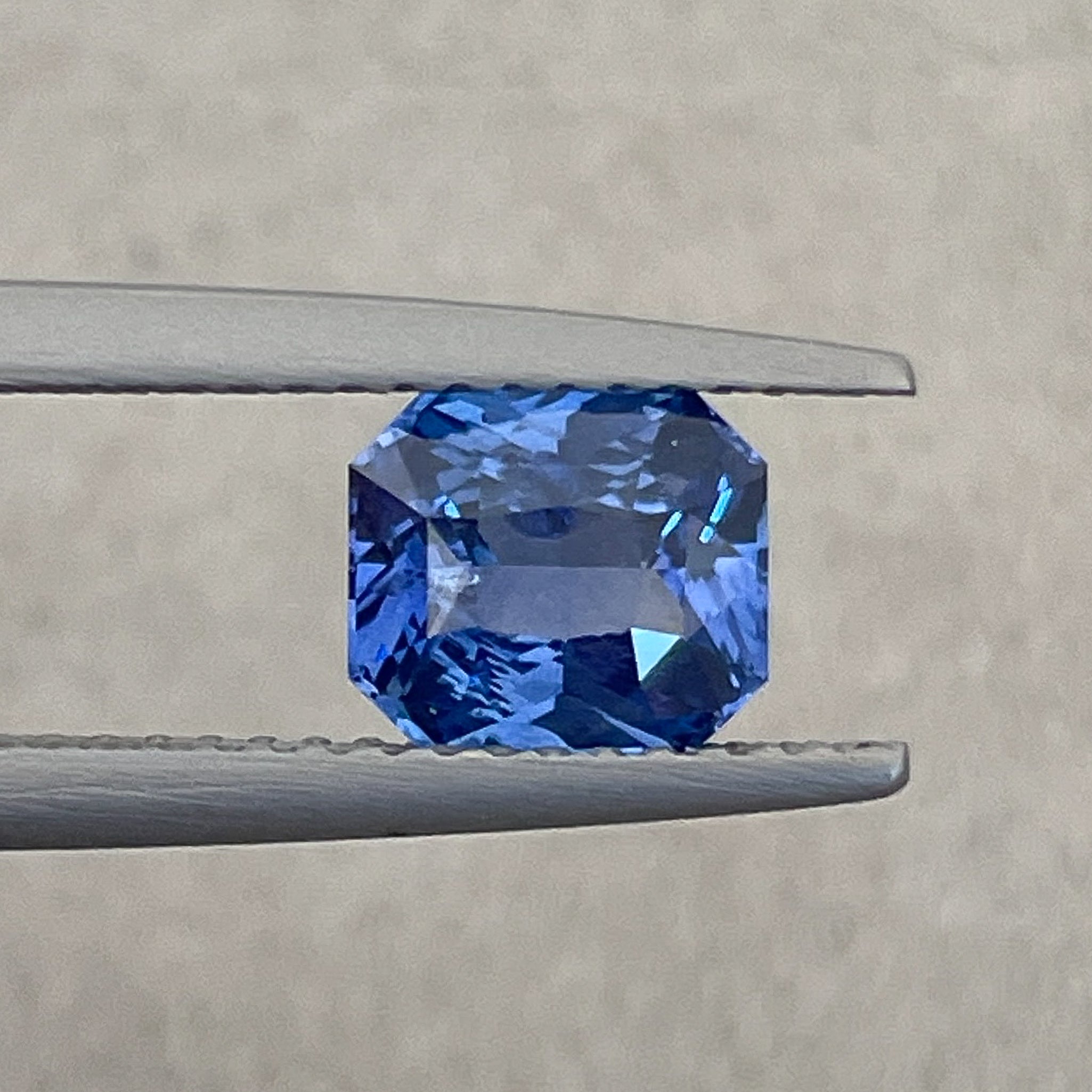 Natural Ceylon Blue Sapphire 1.52 Ct radiant cut by NASHGEMS, vivid blue loose gemstone for engagement or custom jewelry.