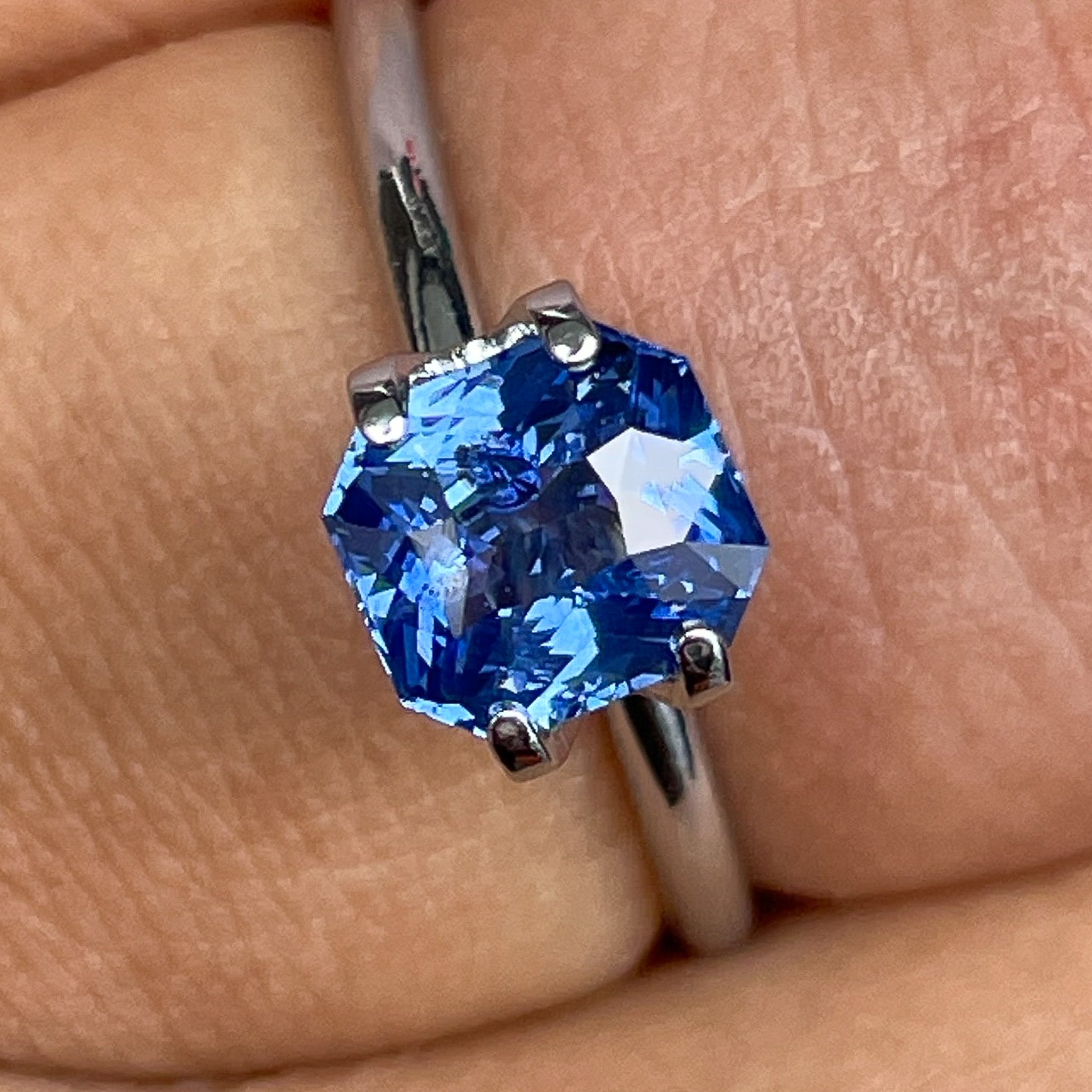 Natural Ceylon Blue Sapphire 1.52 Ct radiant cut by NASHGEMS, vivid blue loose gemstone for engagement or custom jewelry.