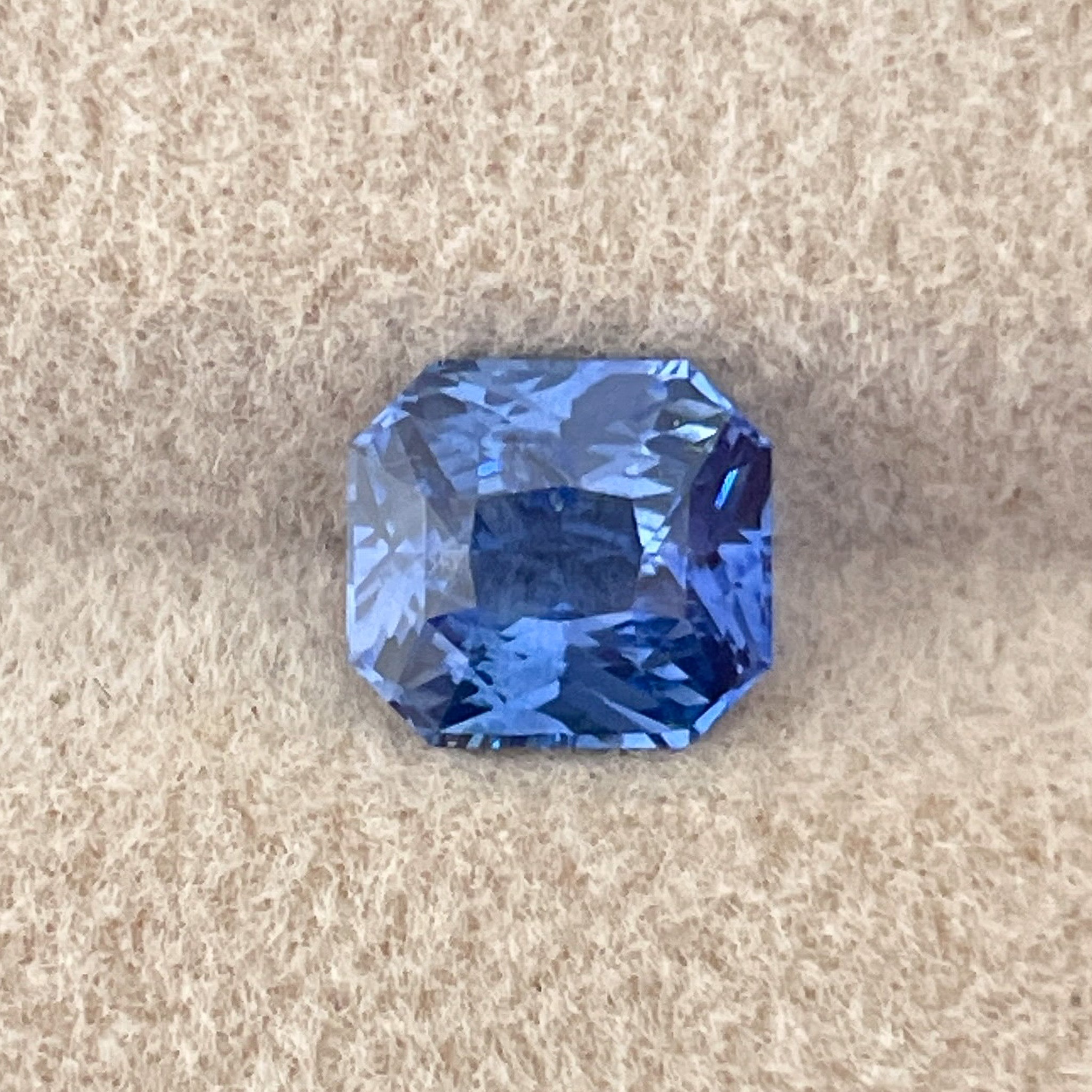 Natural Ceylon Blue Sapphire 1.52 Ct radiant cut by NASHGEMS, vivid blue loose gemstone for engagement or custom jewelry.