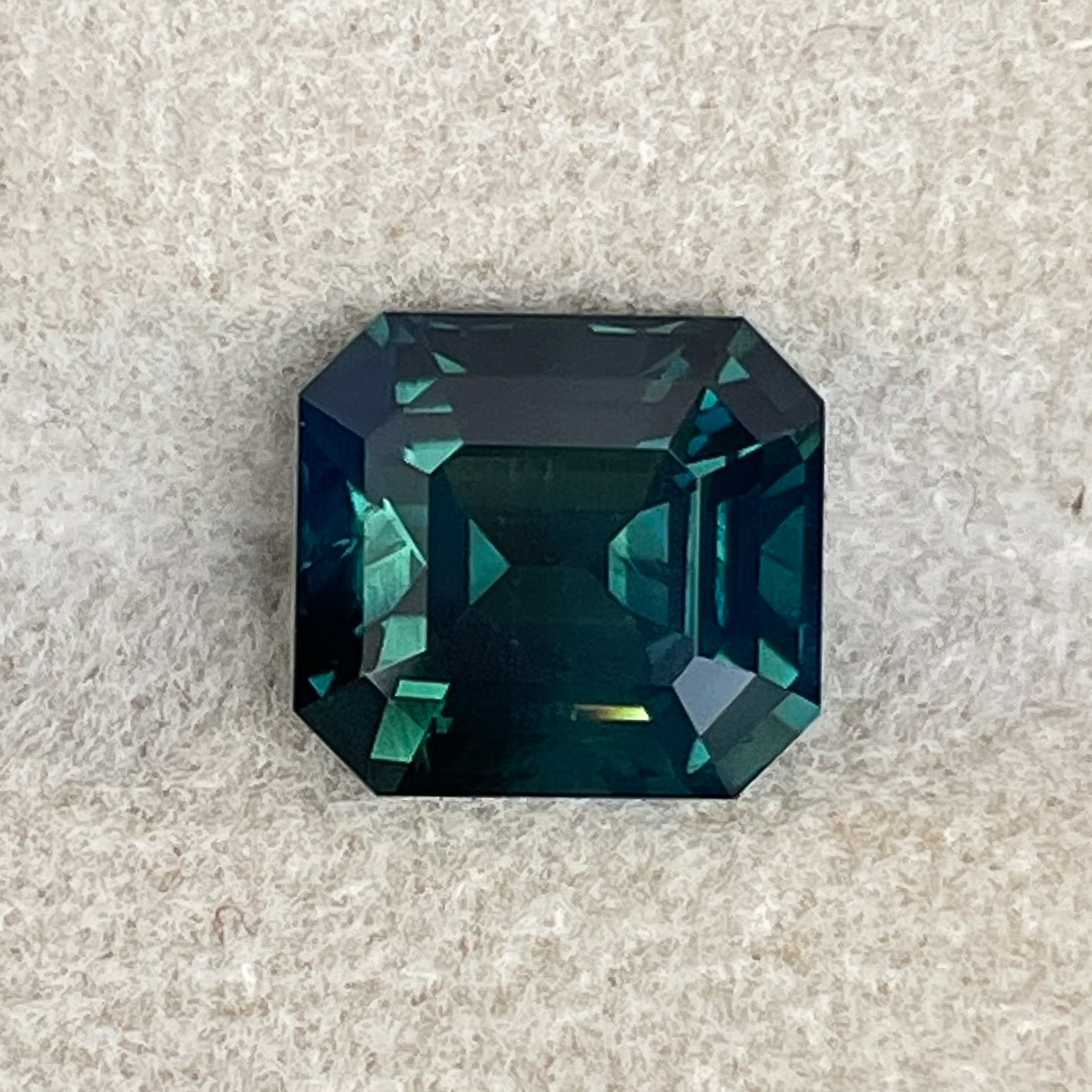 Natural forest green sapphire 3.59 Ct teal loose gemstone in emerald cut by NASHGEMS, perfect for custom engagement rings.