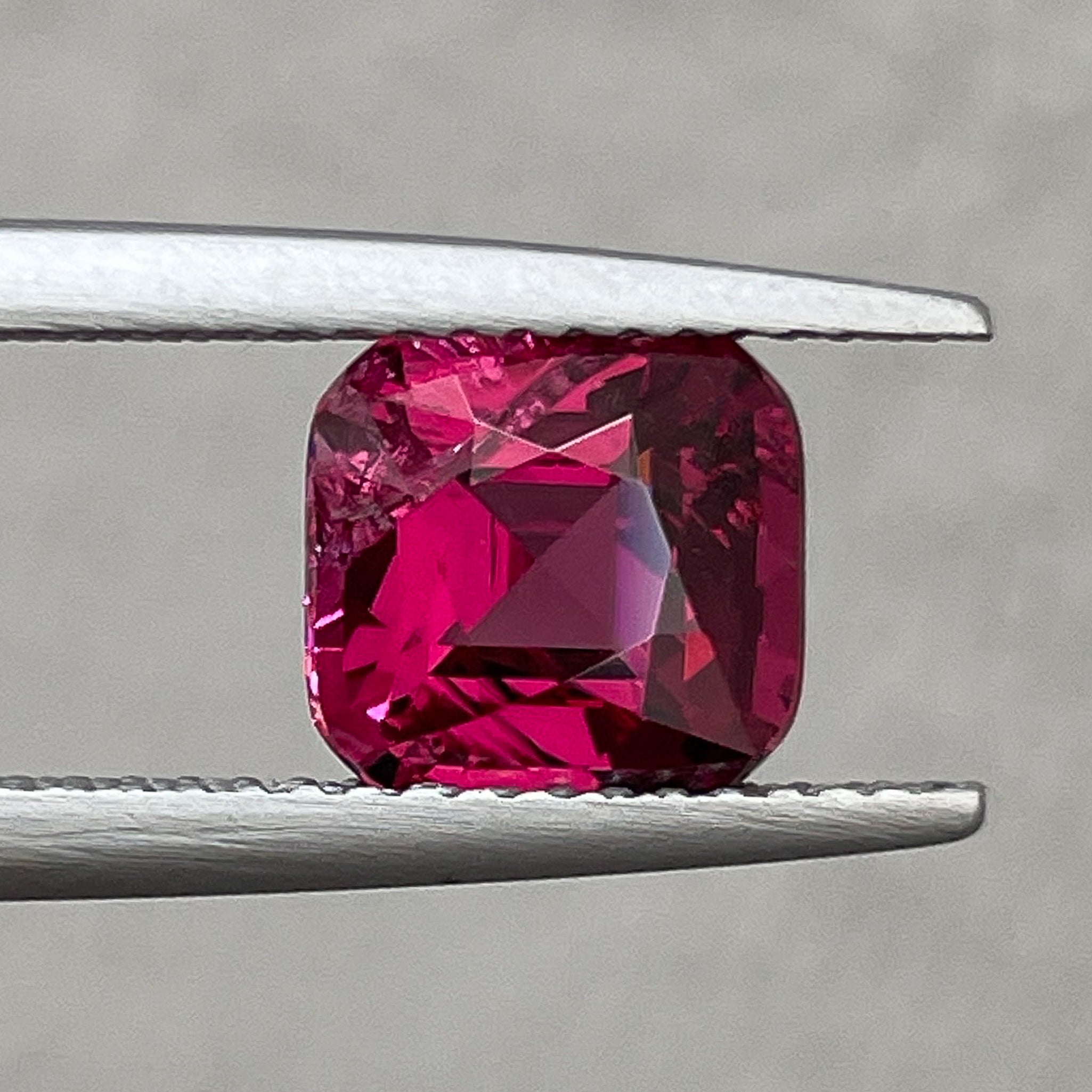 Natural Rhodolite Garnet 2.32 Ct cushion cut loose gemstone in raspberry red, ideal for engagement rings by NASHGEMS.
