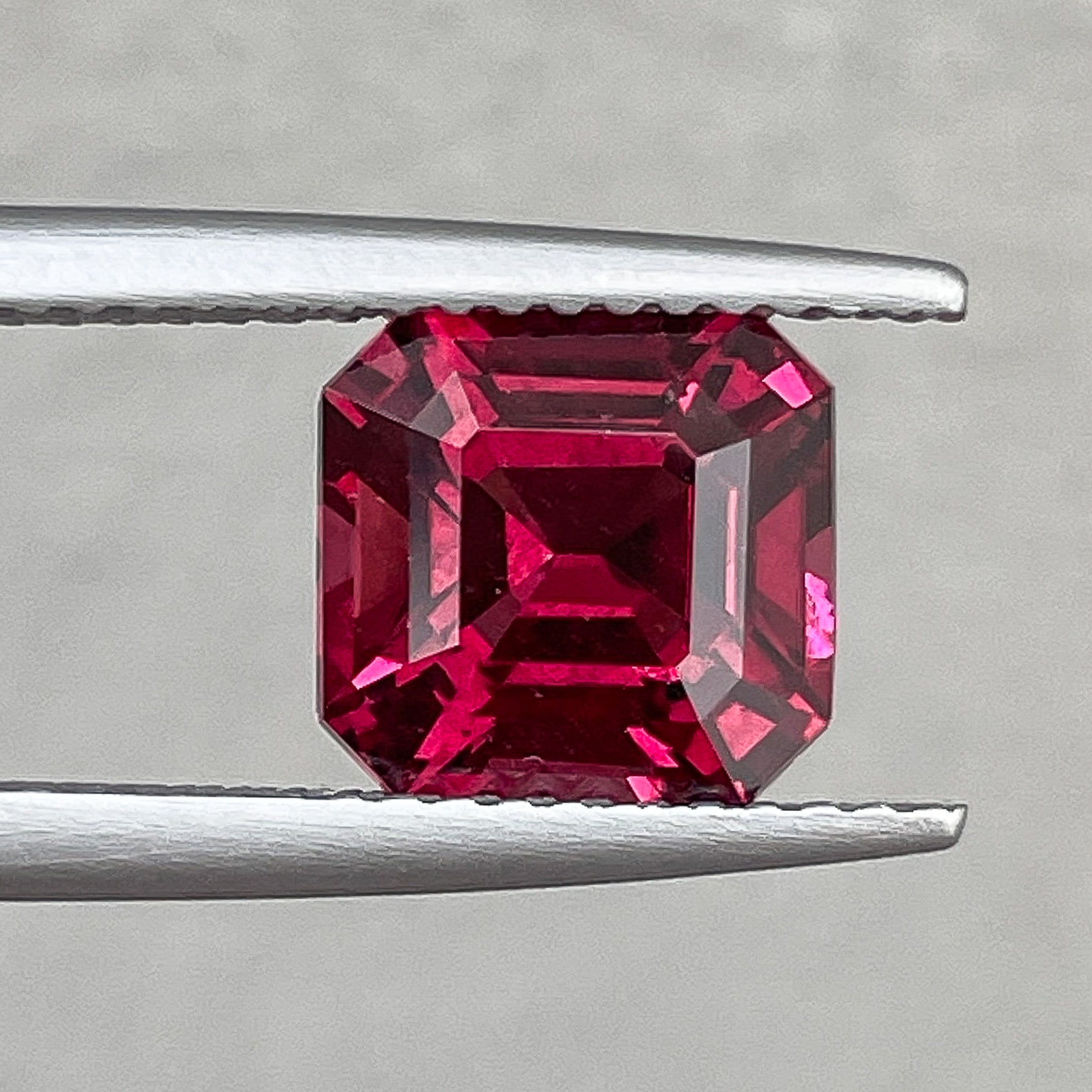 Deep red 3.12 Ct natural Pyrope Almandite Garnet loose gemstone in emerald cut, ideal for engagement rings, by NASHGEMS.