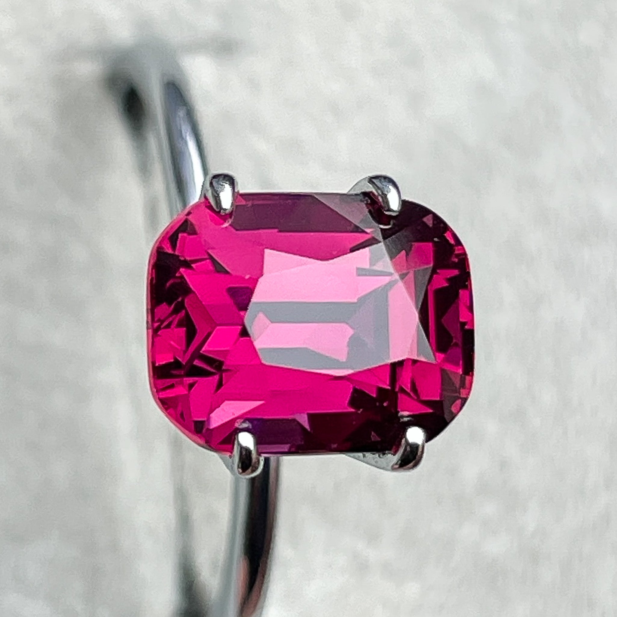 Natural Rhodolite Garnet 3.39 Ct cushion cut gemstone in raspberry red, VVS clarity, ideal for engagement rings.