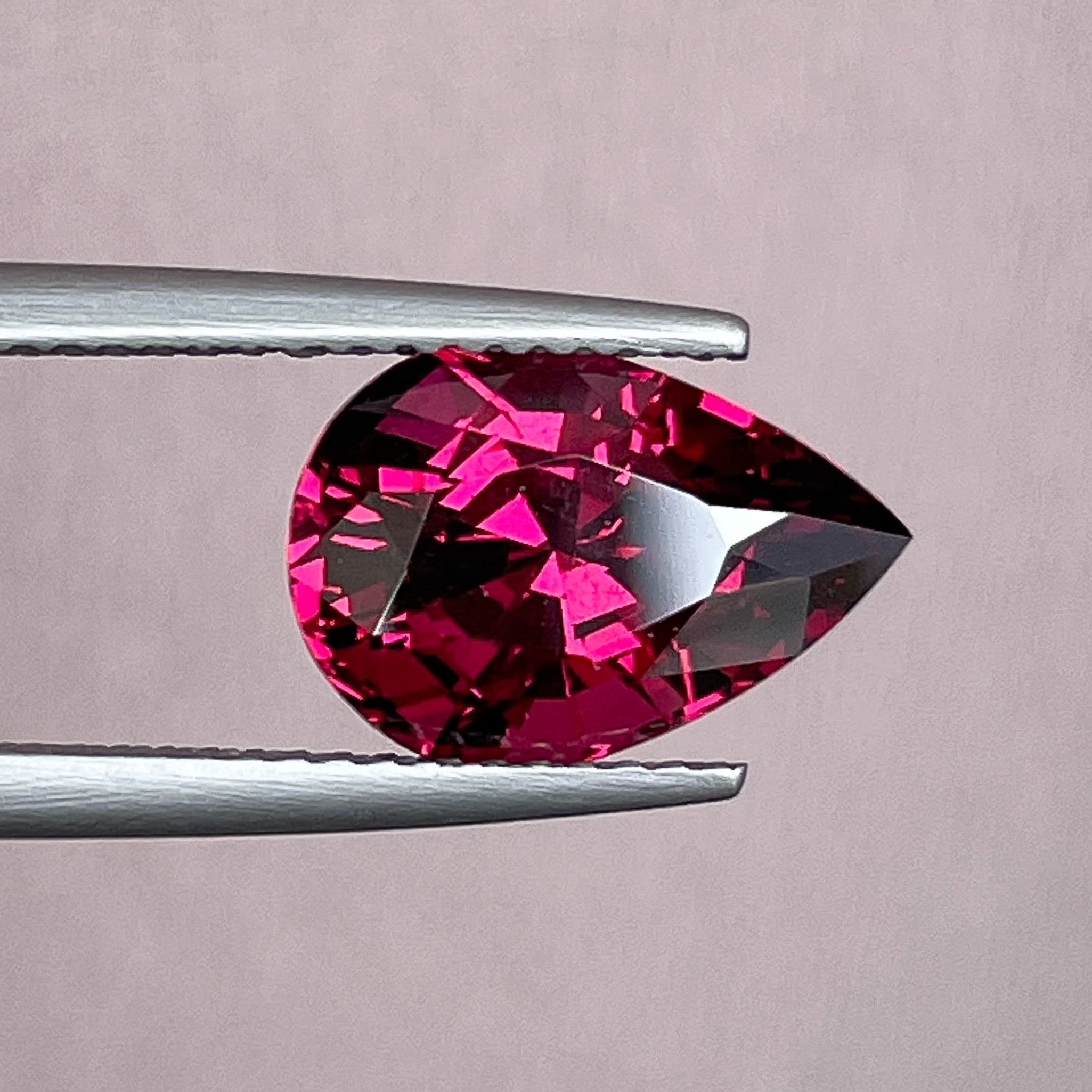 Natural Rhodolite Garnet 4.33 Ct pear-shaped loose gemstone with raspberry red color, ideal for engagement rings.