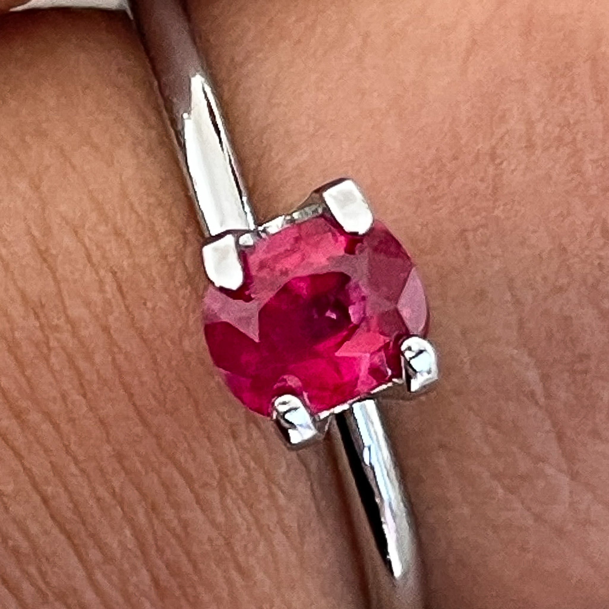 Natural 0.67 Ct cushion cut ruby gemstone from NASHGEMS, loose and unheated, ideal for engagement rings.