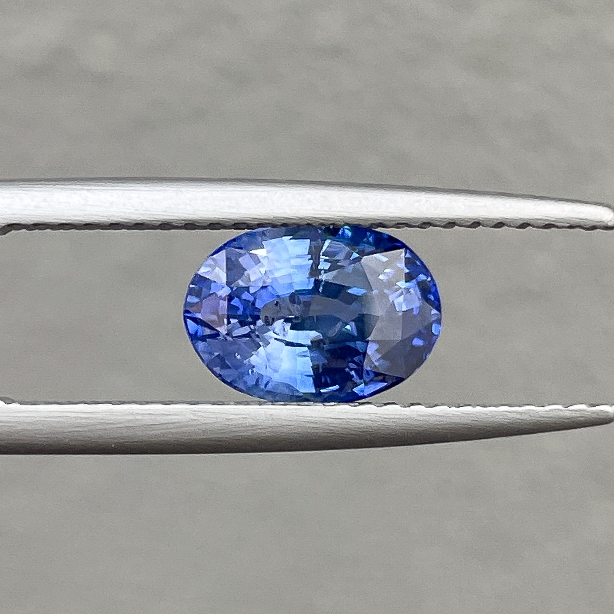 Natural Ceylon blue sapphire loose gemstone, 2.27 carats, oval cut, from NASHGEMS, ideal for engagement rings or custom jewelry.