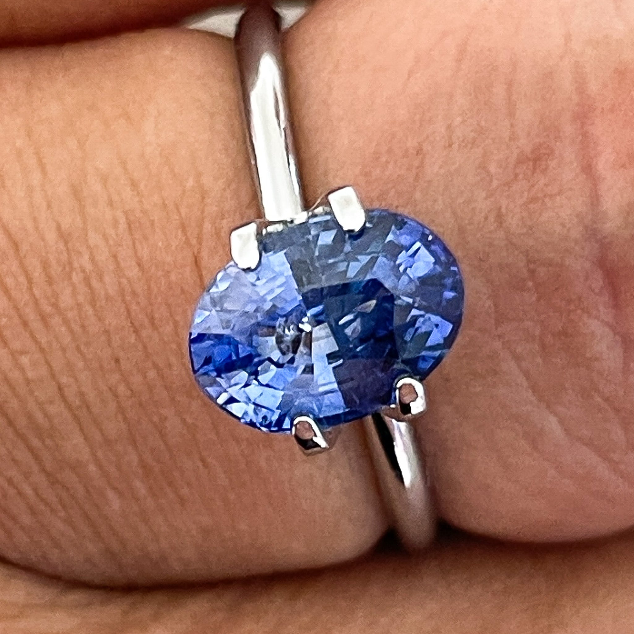 Natural Ceylon blue sapphire loose gemstone, 2.27 carats, oval cut, premium quality blue sapphire for engagement or custom jewelry.