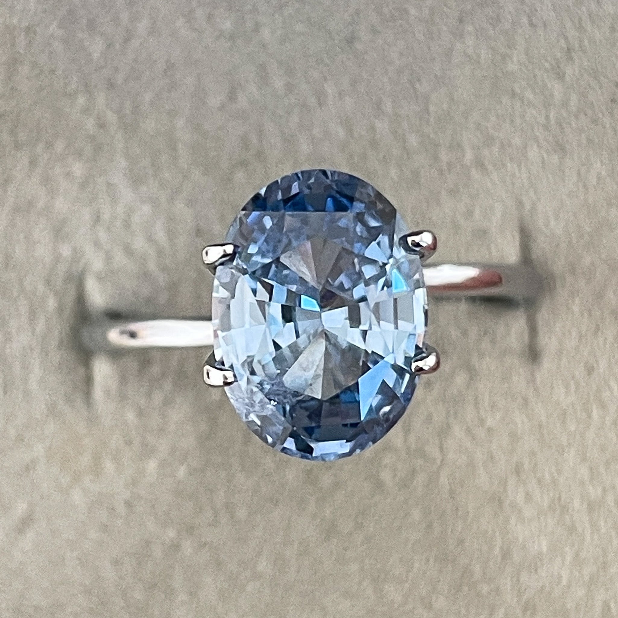 Natural Ceylon blue sapphire, 3.34 Ct oval cut loose gemstone by NASHGEMS, ideal for engagement rings or custom jewelry.