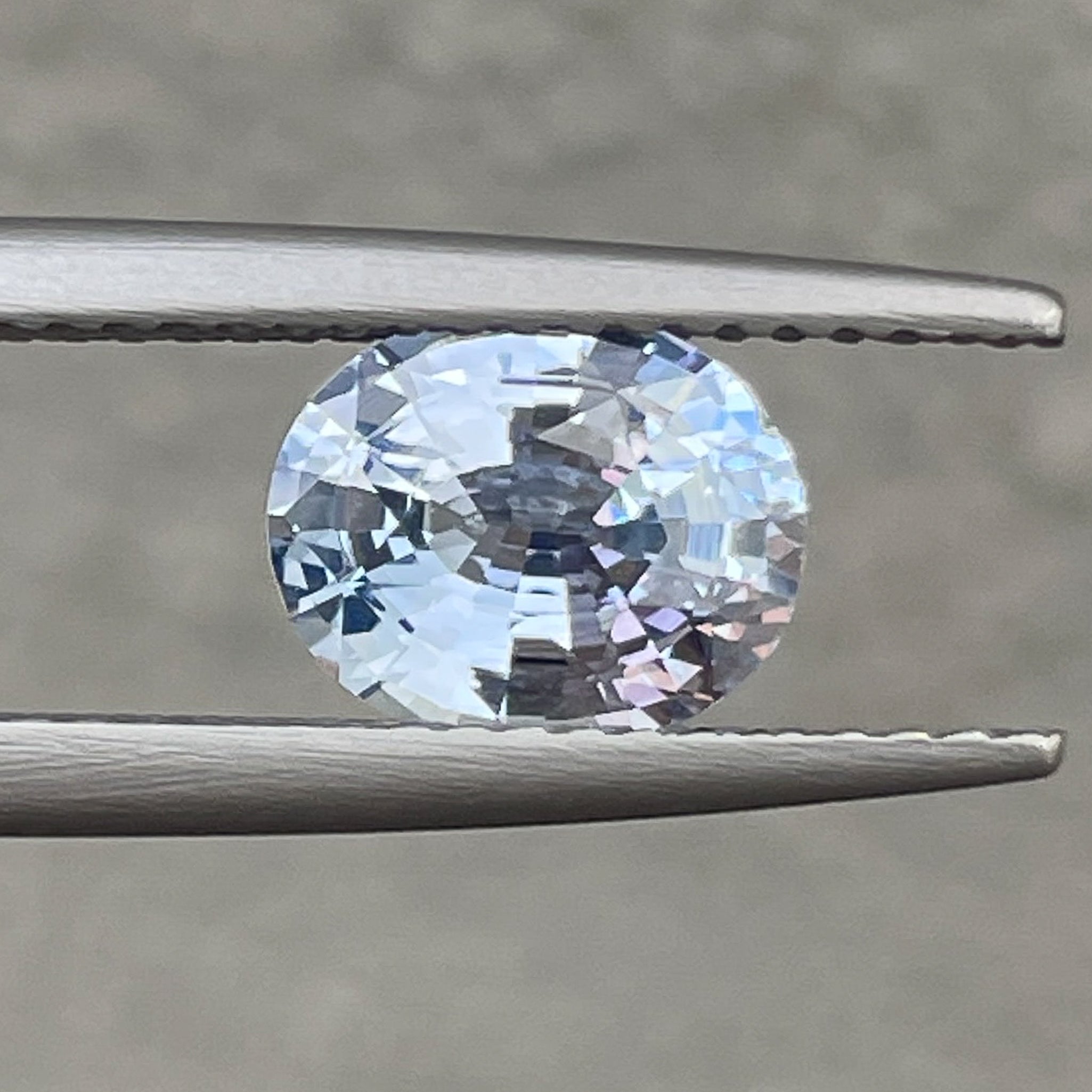 Natural Ceylon Pale Blue Sapphire 1.56 Ct oval cut loose gemstone from NASHGEMS, ideal for engagement rings.