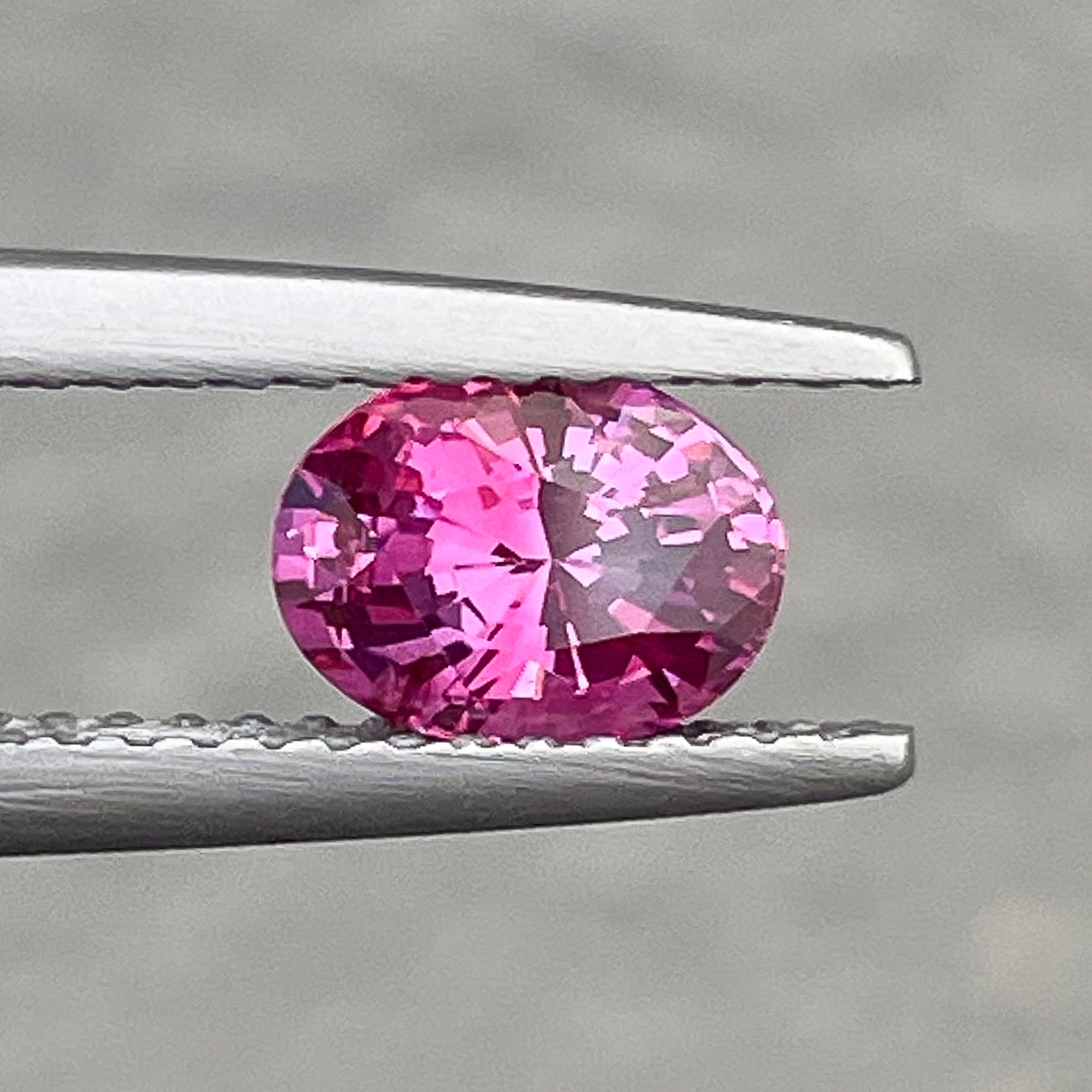 Natural pink sapphire loose gemstone, 1.00 carat oval cut, heat treated pink sapphire by NASHGEMS for engagement jewelry.