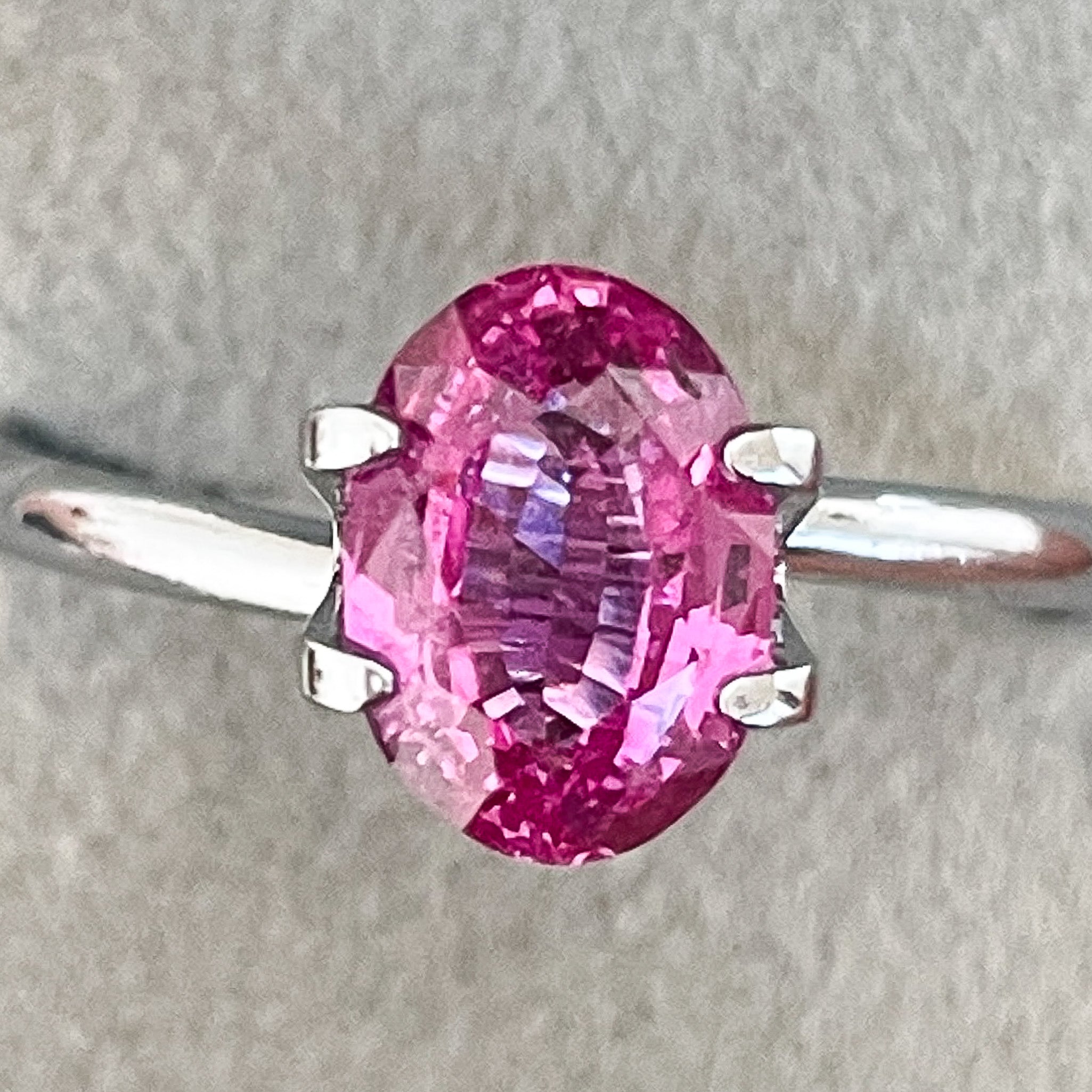 Natural pink sapphire loose gemstone, 2.05 carats, oval cut, heated pink sapphire from NASHGEMS for engagement jewelry.
