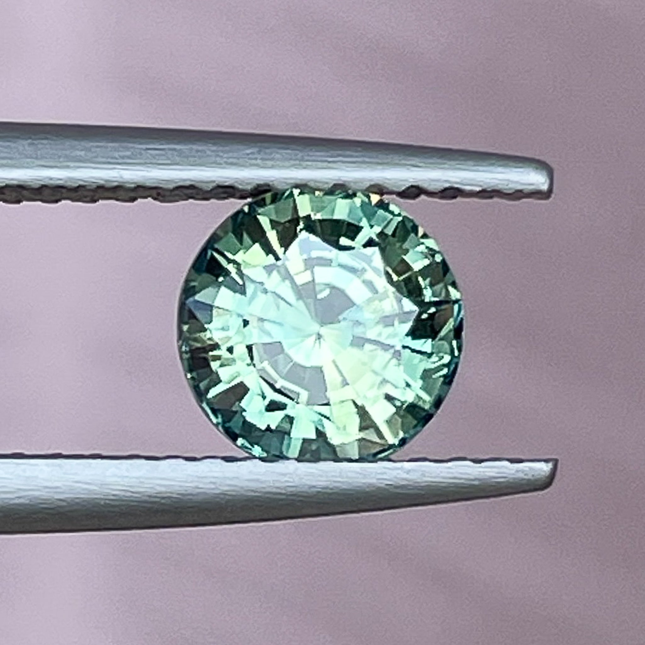 Natural green teal sapphire loose gemstone, round cut, 1.50 Ct, heat treated, ideal for engagement rings or custom jewelry.
