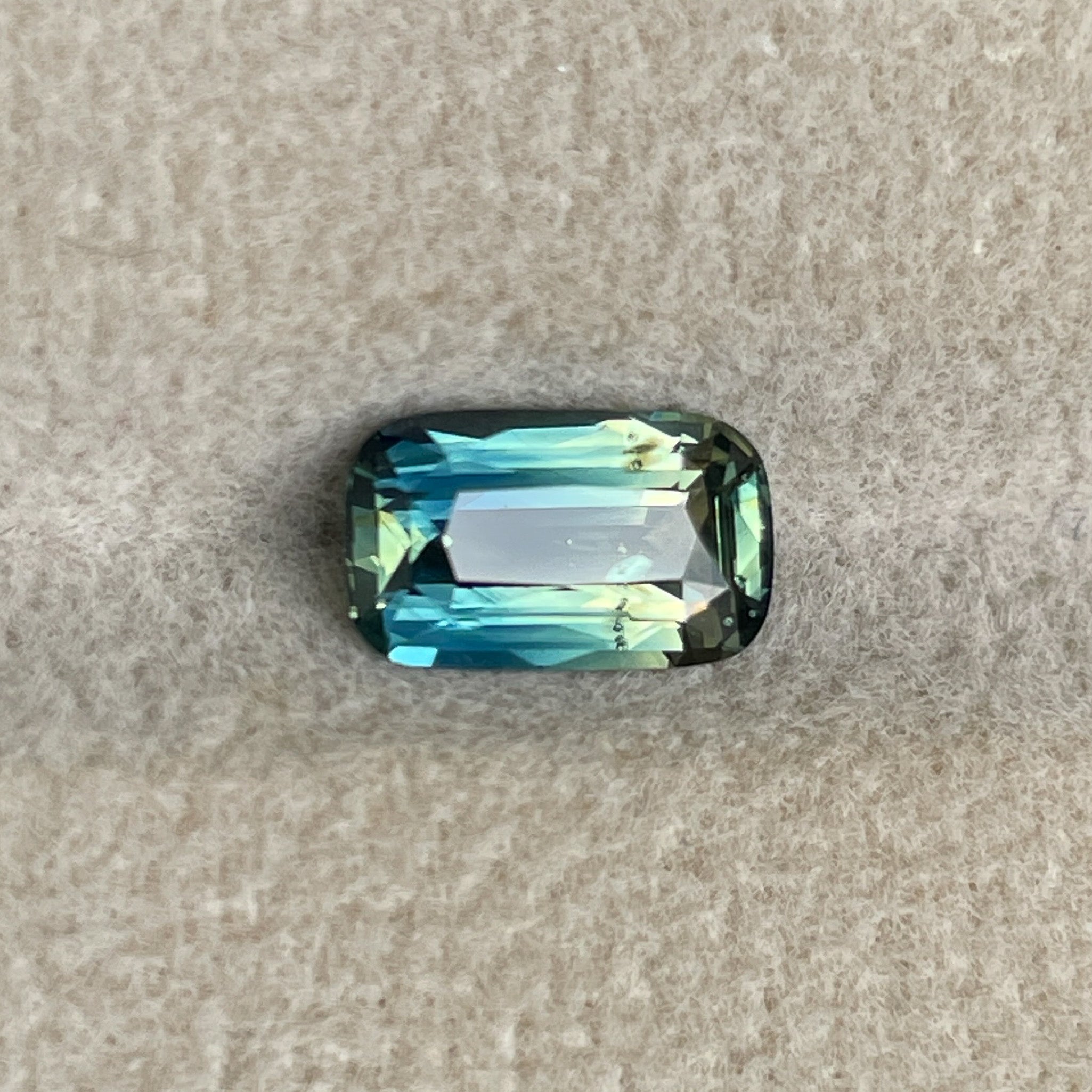 Teal natural parti bi-color sapphire 1.55 Ct cushion cut loose gemstone for engagement or custom jewelry by NASHGEMS.