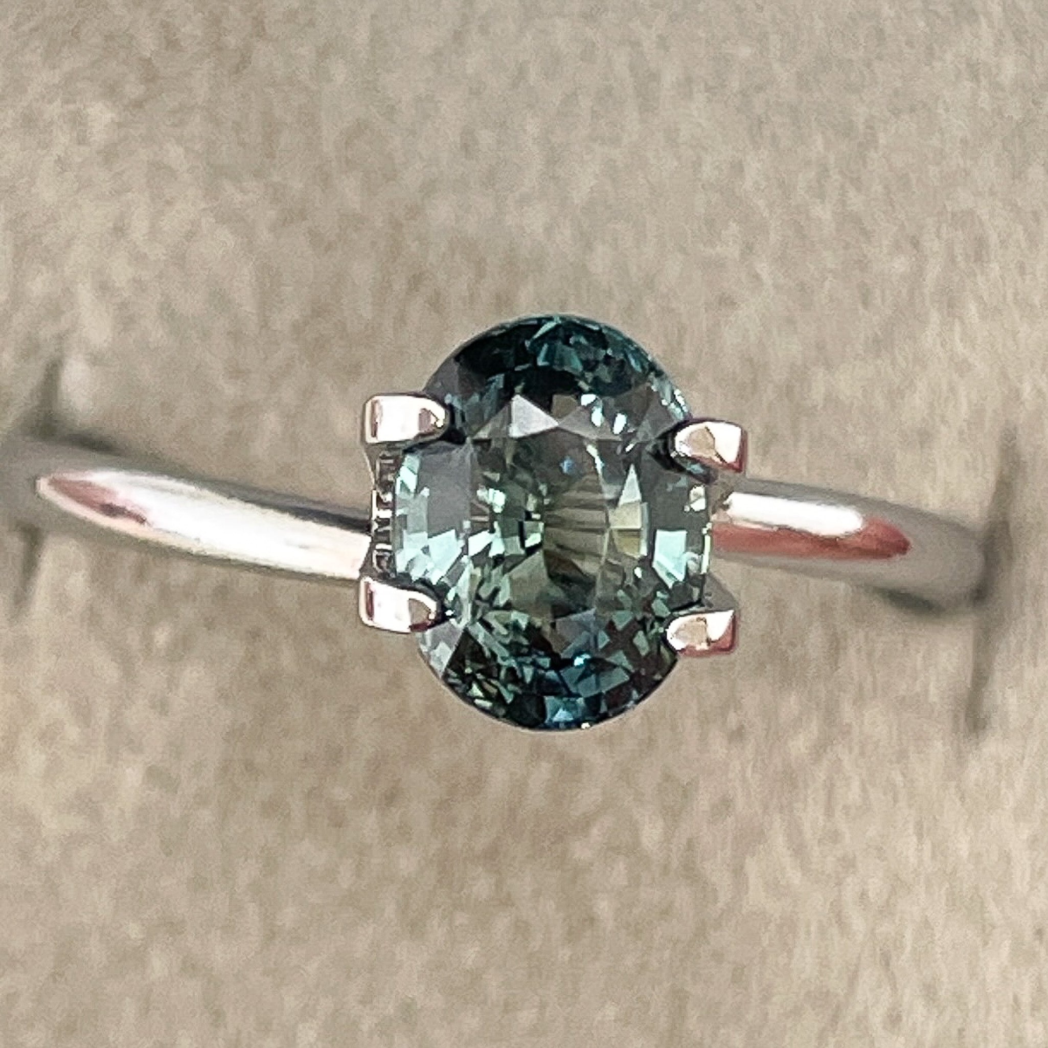 Natural teal blue-green sapphire loose stone, 2.03 Ct oval cut by NASHGEMS, ideal for engagement rings or custom jewelry.