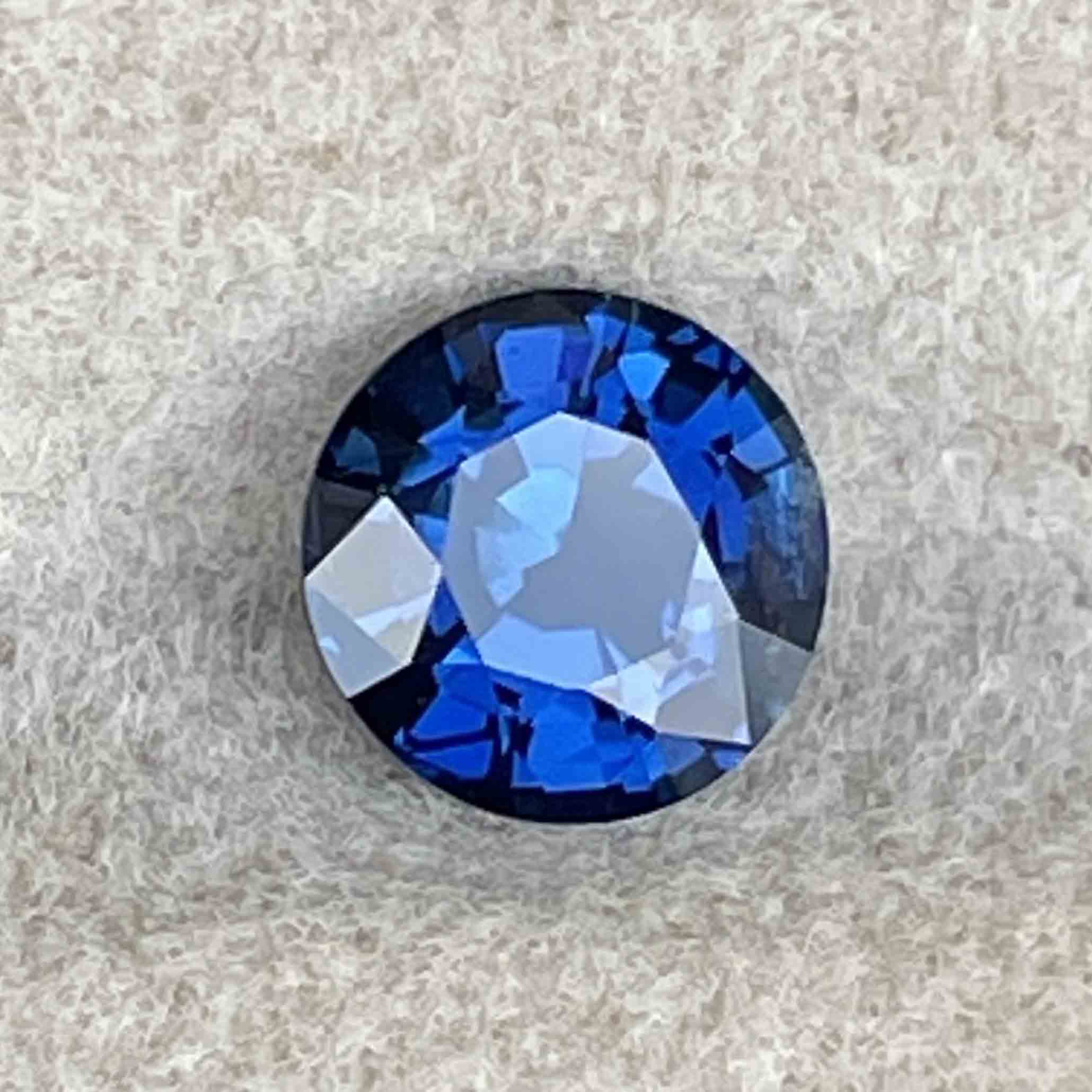 Natural blue sapphire loose stone, 1.16 Ct round cut, heat treated by NASHGEMS, ideal for engagement rings or custom jewelry.