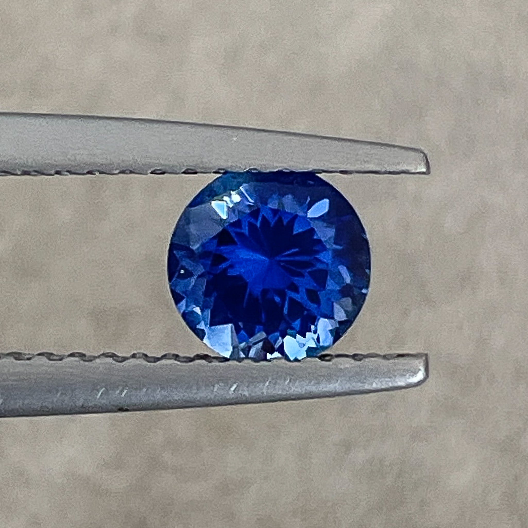 Natural Ceylon Blue Sapphire 0.80 Ct round cut loose gemstone from NASHGEMS, ideal for engagement rings