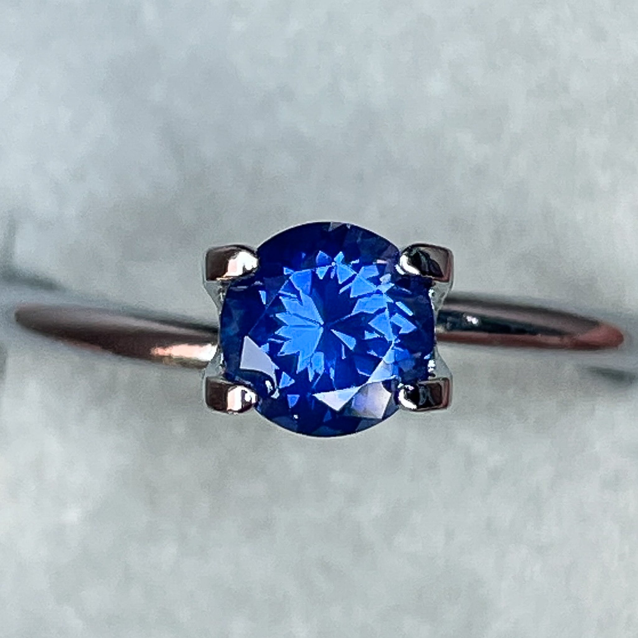 Natural Ceylon Blue Sapphire 0.80 Ct round cut loose gemstone by NASHGEMS, perfect for engagement rings, VVS clarity.