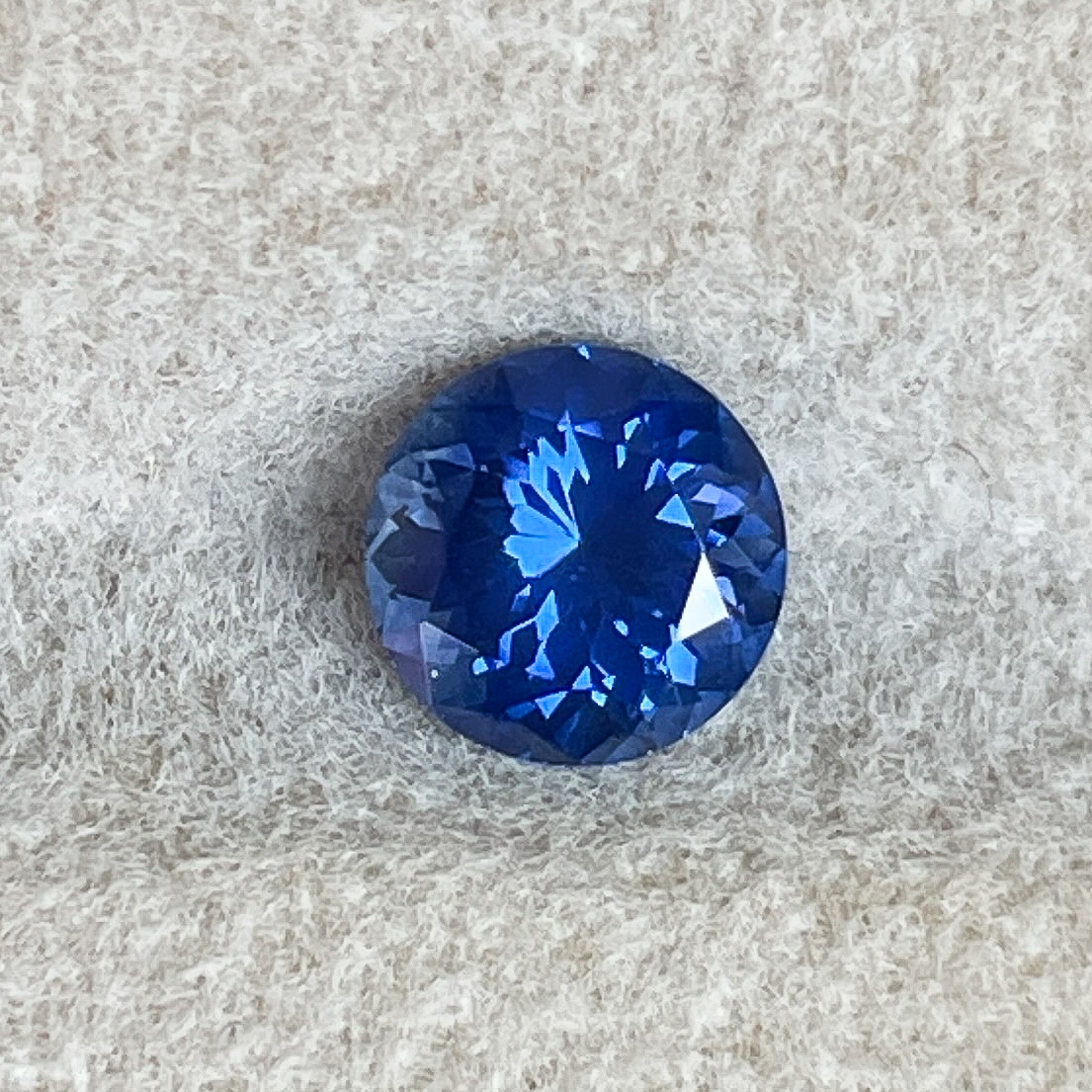 Natural Ceylon Blue Sapphire 0.80 Ct round cut VVS loose gemstone by NASHGEMS, perfect for engagement rings.