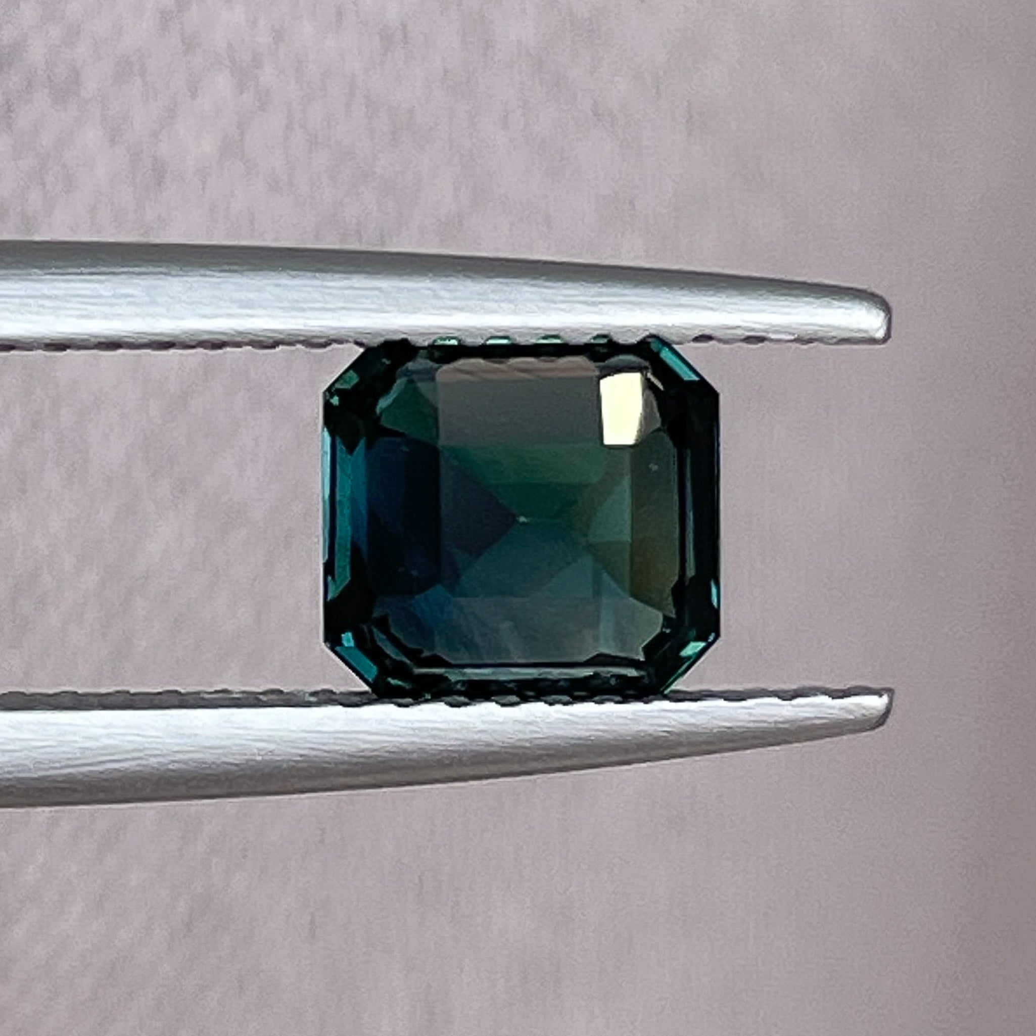 Teal green sapphire loose gemstone, 2.02 carats, emerald cut, heat treated by NASHGEMS for custom engagement rings.