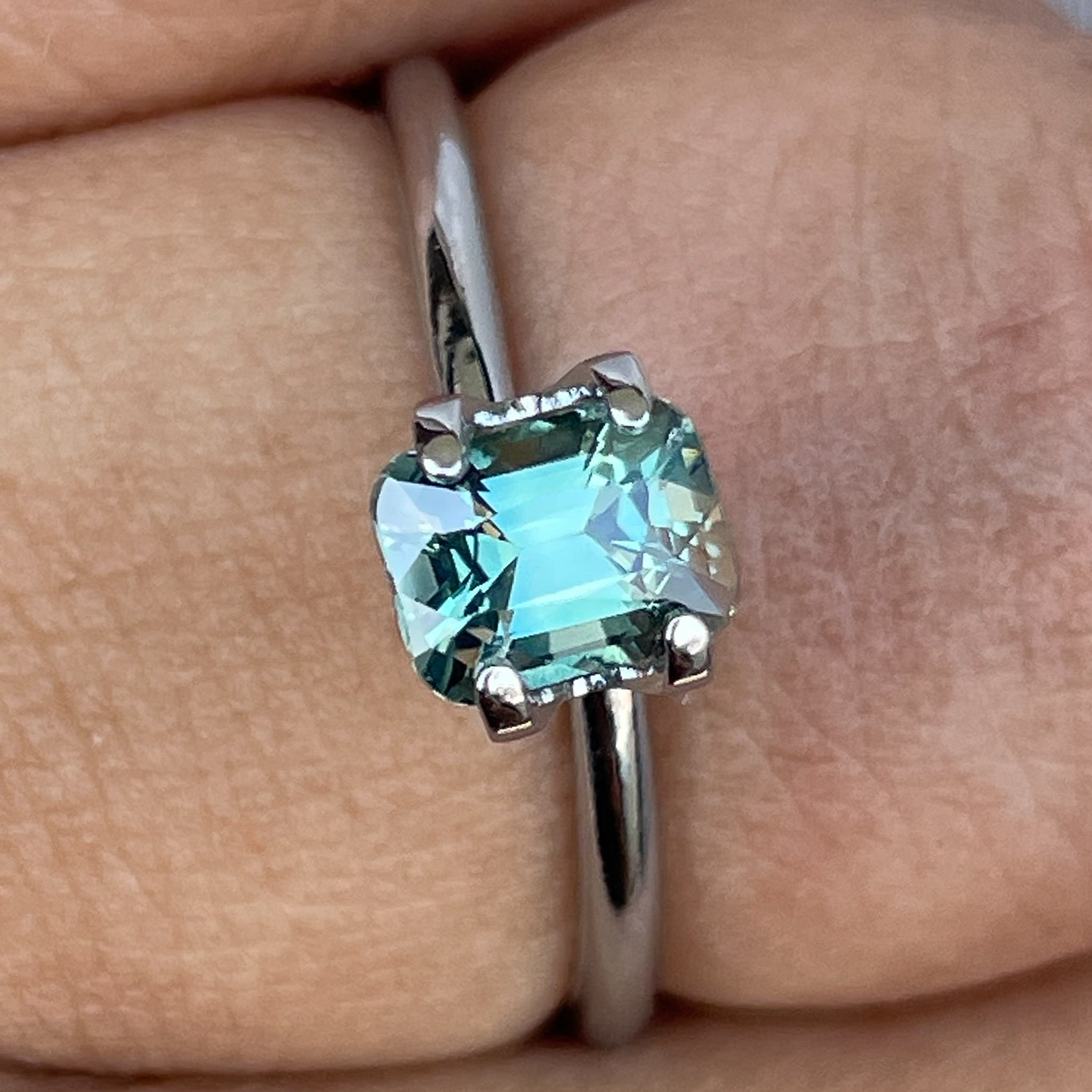 Natural teal green sapphire 1.11 Ct cushion cut loose gemstone from NASHGEMS, ideal for engagement rings or custom jewelry.