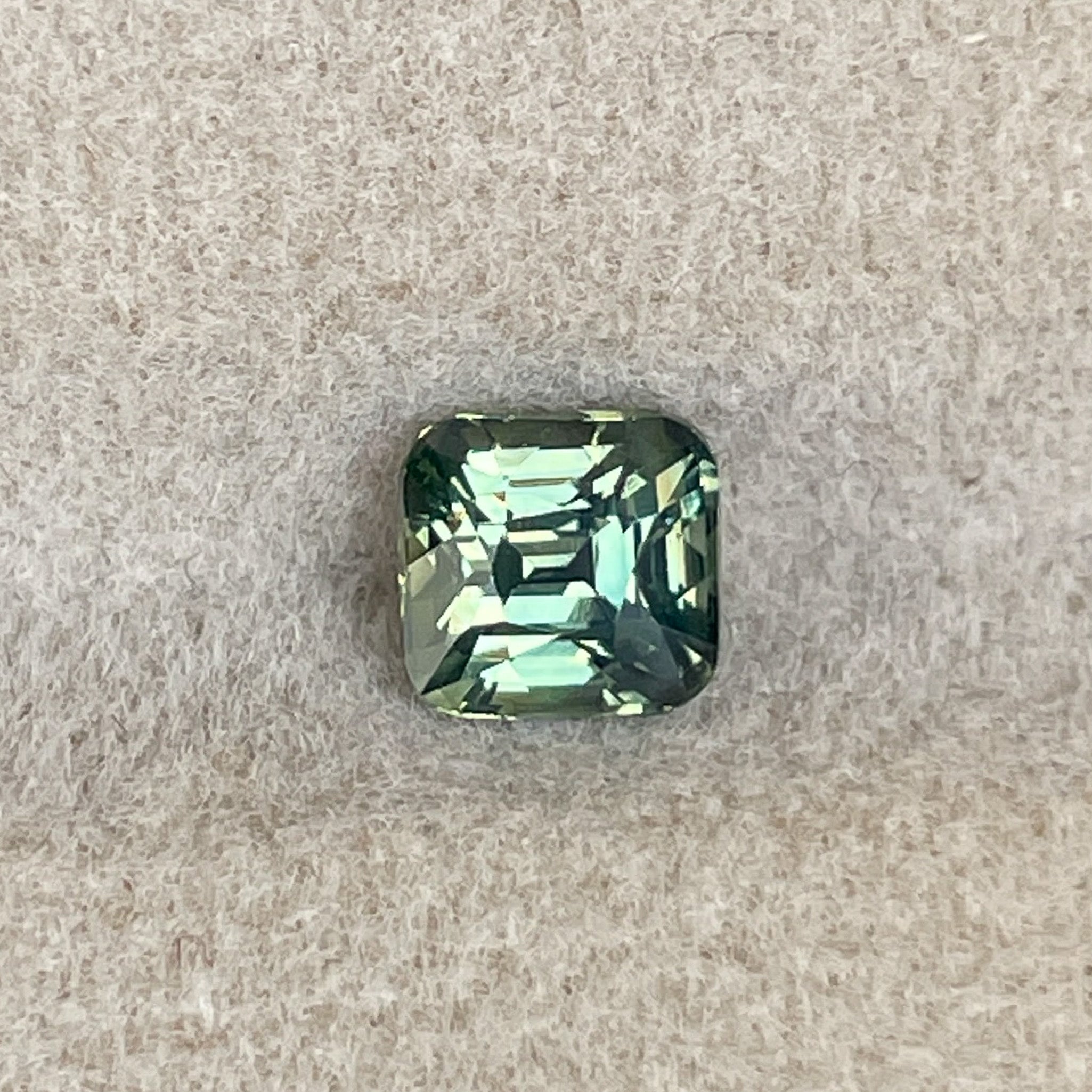 Teal natural pale green sapphire 1.06 Ct cushion cut loose gemstone for engagement or custom jewelry by NASHGEMS.