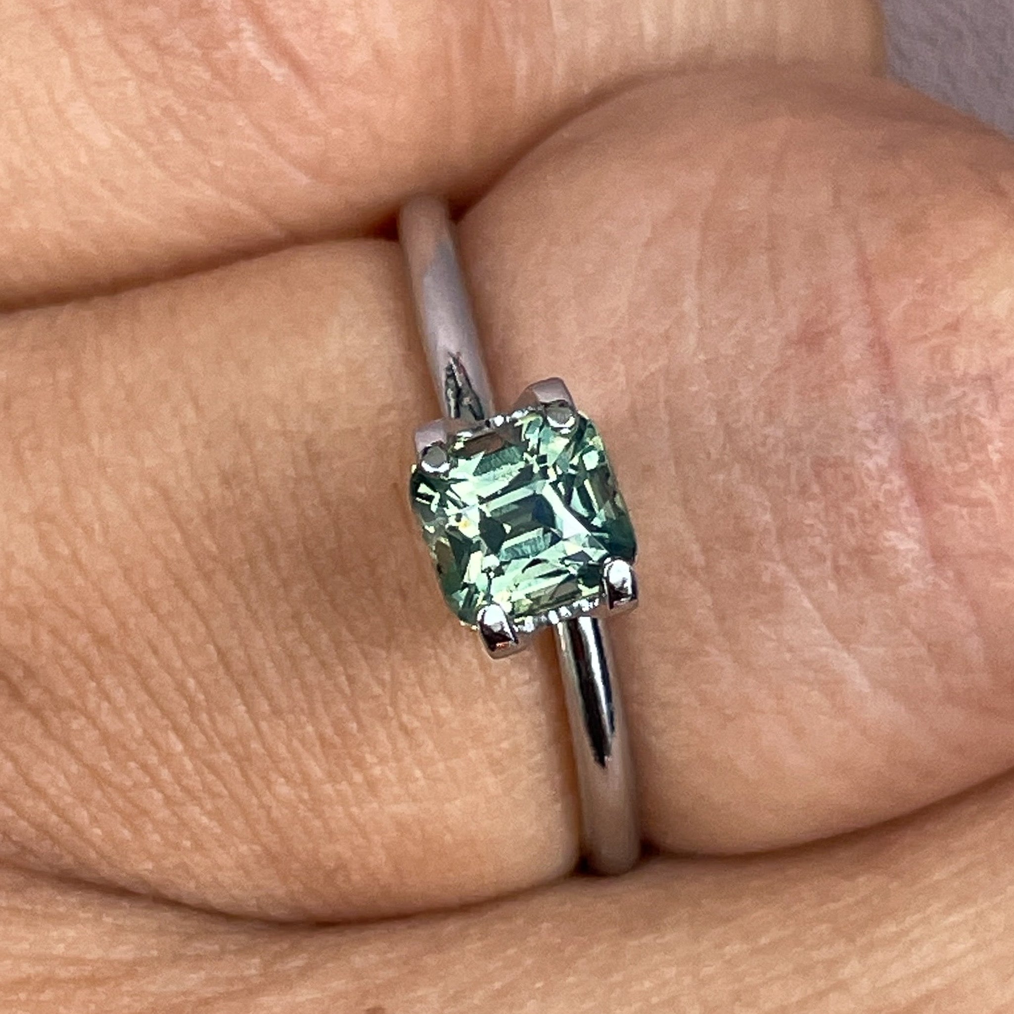 Natural pale green sapphire 1.06 Ct cushion cut loose gemstone by NASHGEMS, perfect for engagement rings or custom jewelry.